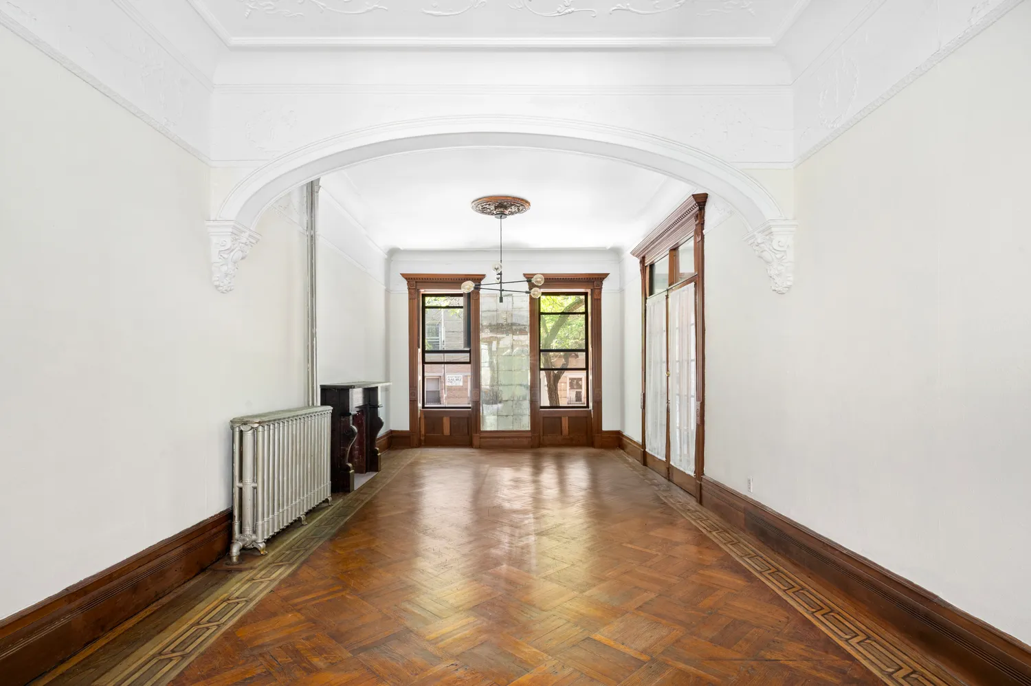 a view of a hallway with windows