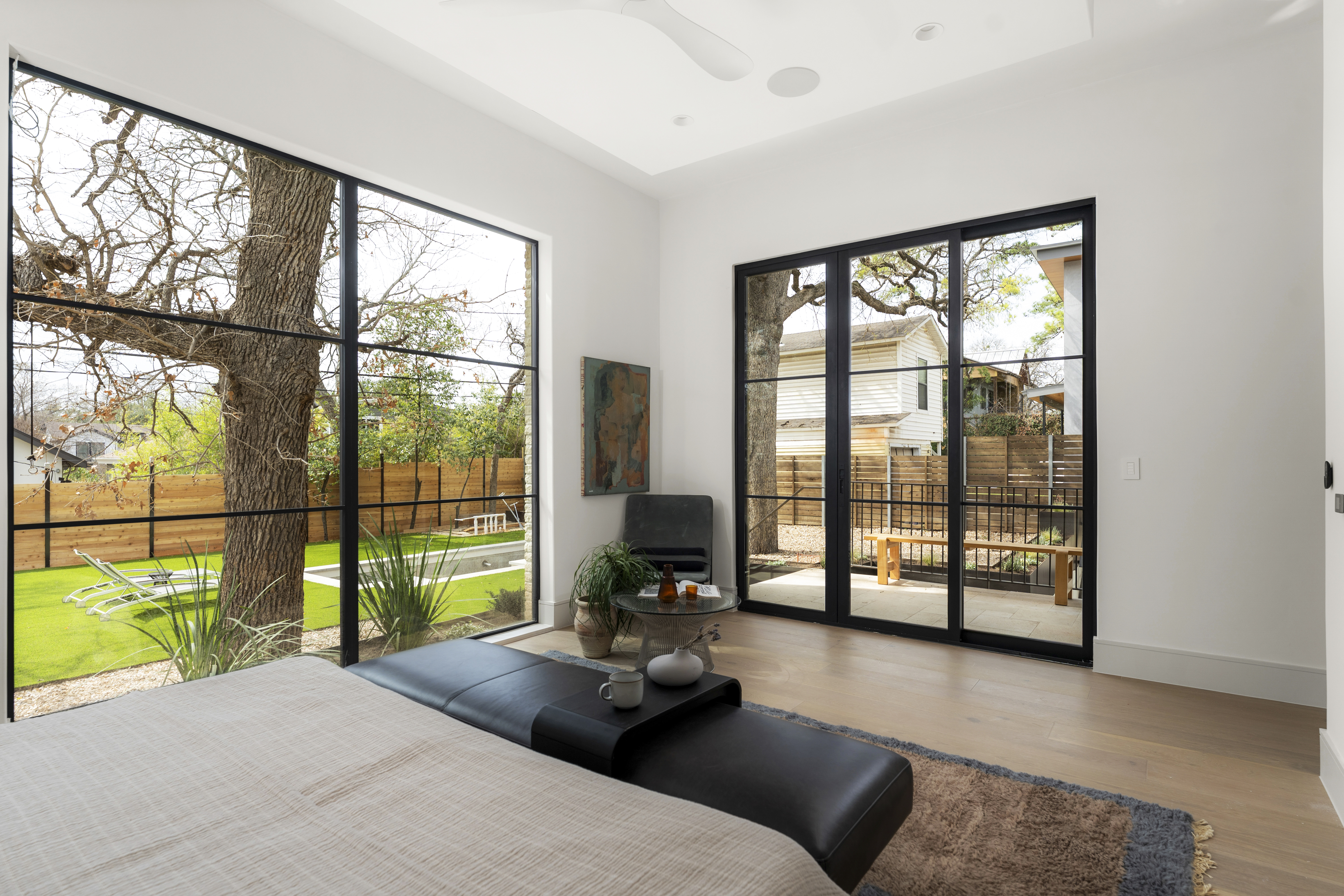 3411 Bridle Path Austin, TX 78703 - Photo 19 of 76 a living room with furniture and large windows