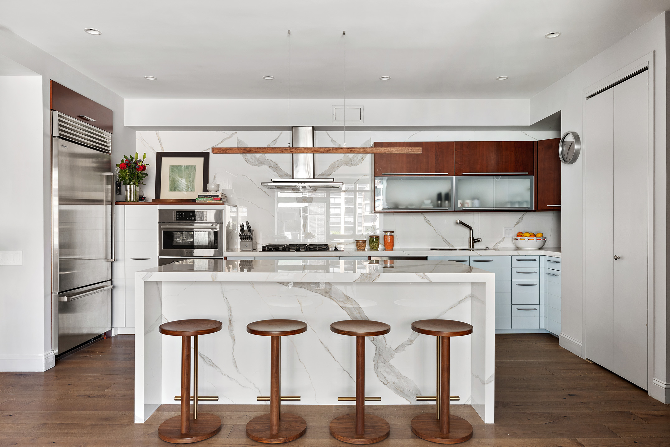 151 West 17th Street, Unit 4G Manhattan, NY 10011 - Photo 2 of 14 a kitchen with stainless steel appliances a sink and cabinets