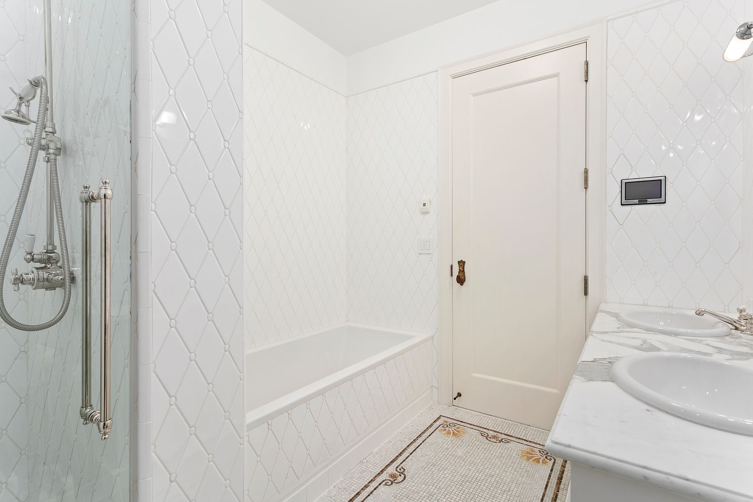 1 Central Park South, Unit 1907 Manhattan, NY 10019 - Photo 7 of 13 a bathroom with a sink and a shower