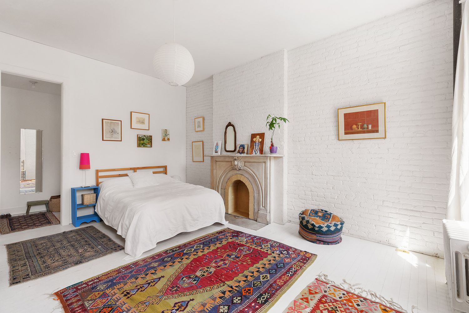 a bedroom with bed and a couch