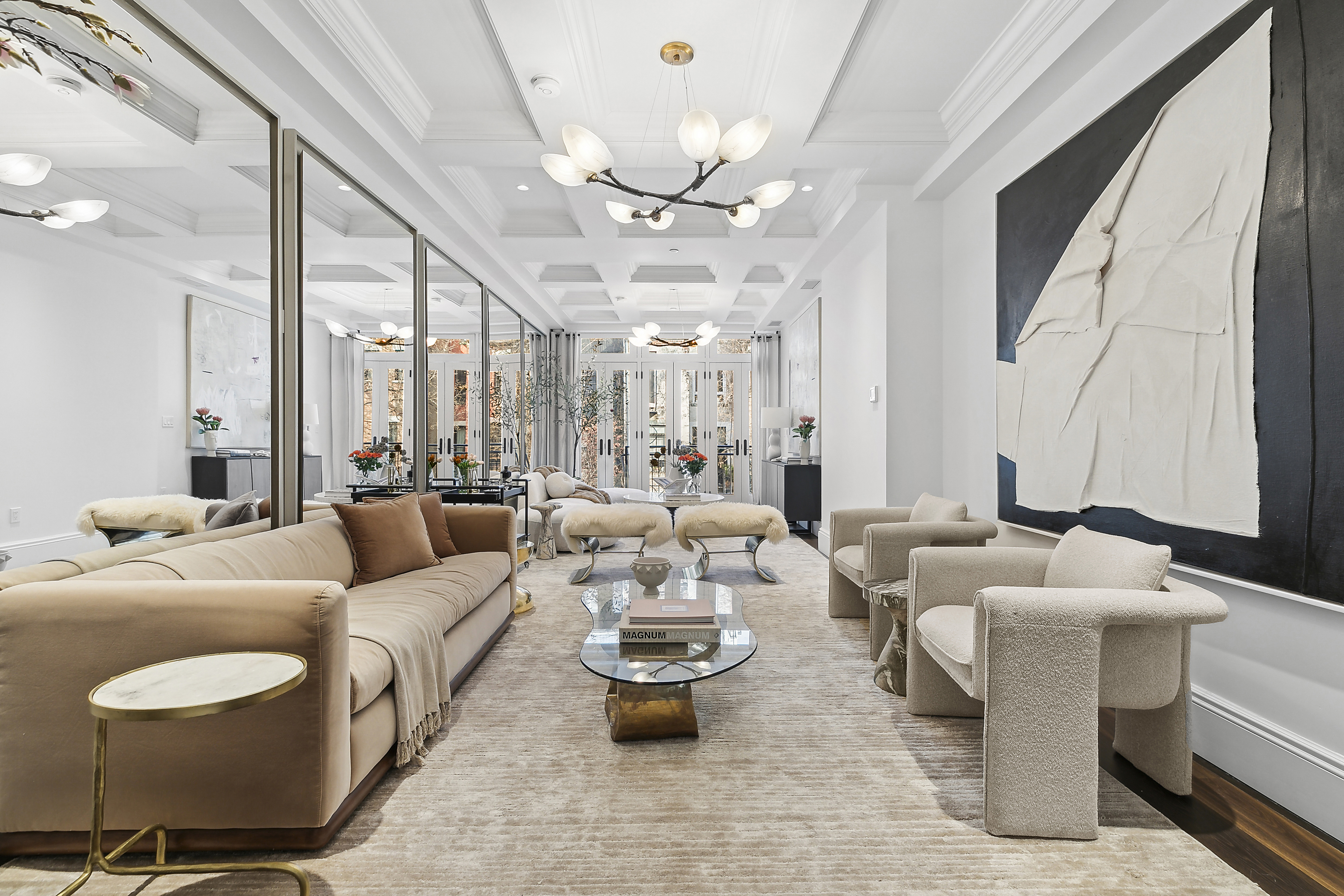 47 West 94th Street Manhattan, NY 10025 - Photo 5 of 20 a living room with furniture and a chandelier