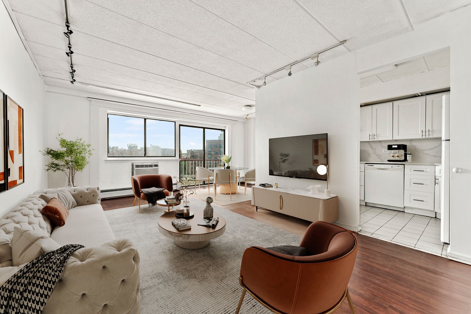 a living room with furniture and a flat screen tv