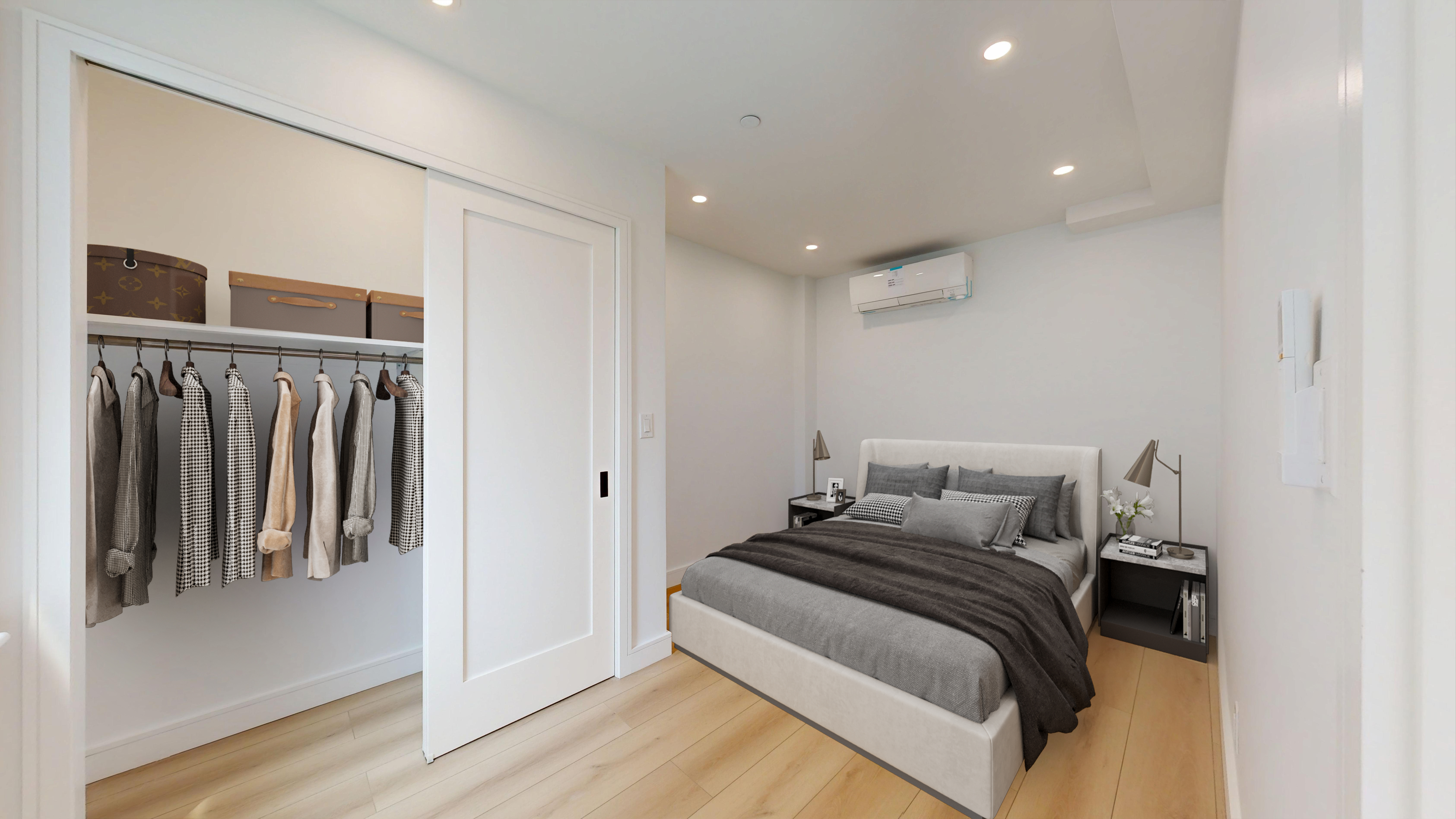 5614 3rd Avenue, Unit 2 Brooklyn, NY 11220 - Photo 4 of 12 a bedroom with a bed and a walk in closet