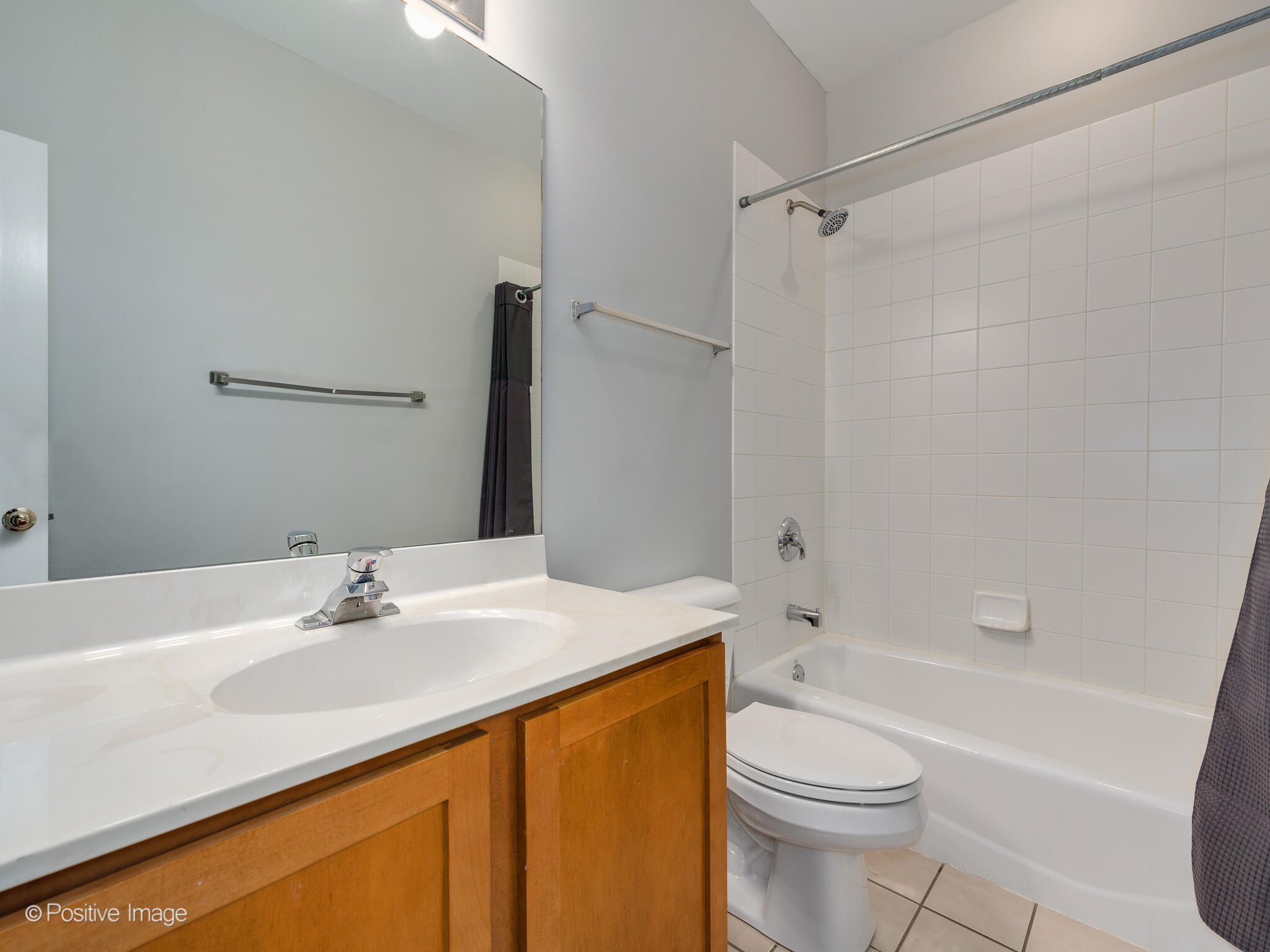 855 North May Street, Unit G Chicago, IL 60642 - Photo 19 of 28 a bathroom with a sink a toilet and a bathtub