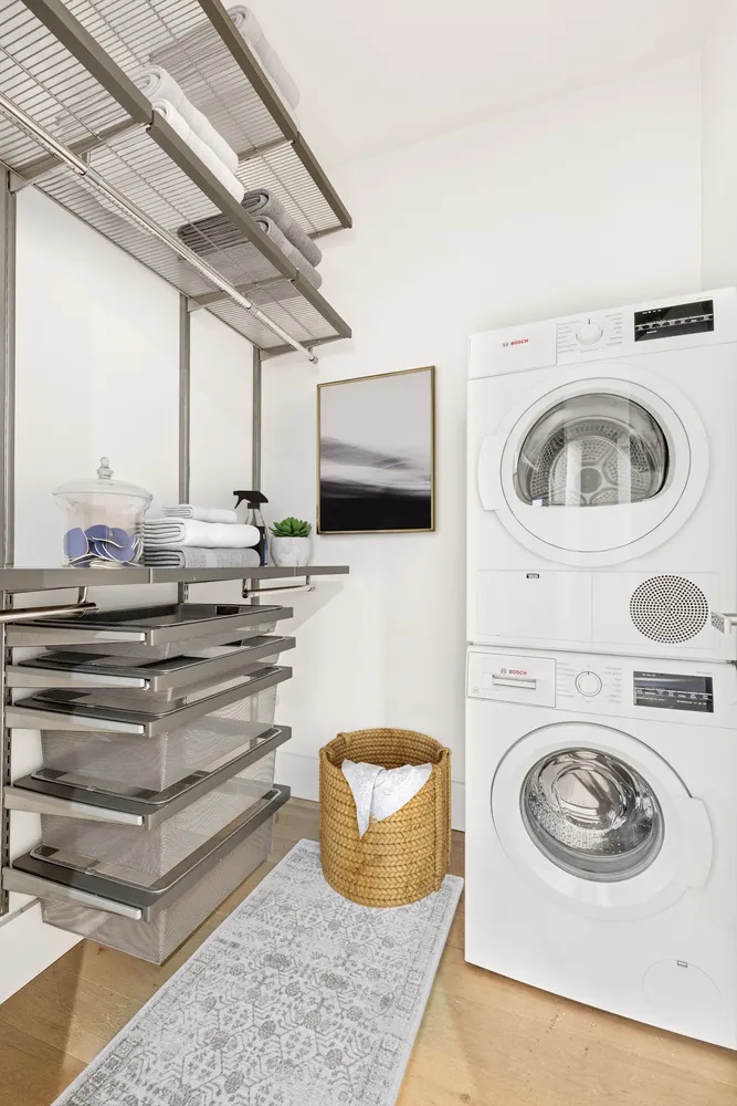 a view of entryway with washer and dryer
