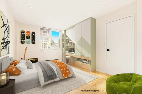 a bedroom with a bed and a couch