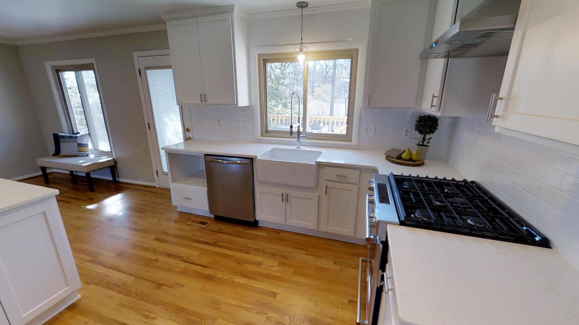 4425 Prescott Road Nashville, TN 37204 - Photo 6 of 26 a kitchen with a window a sink and a stove