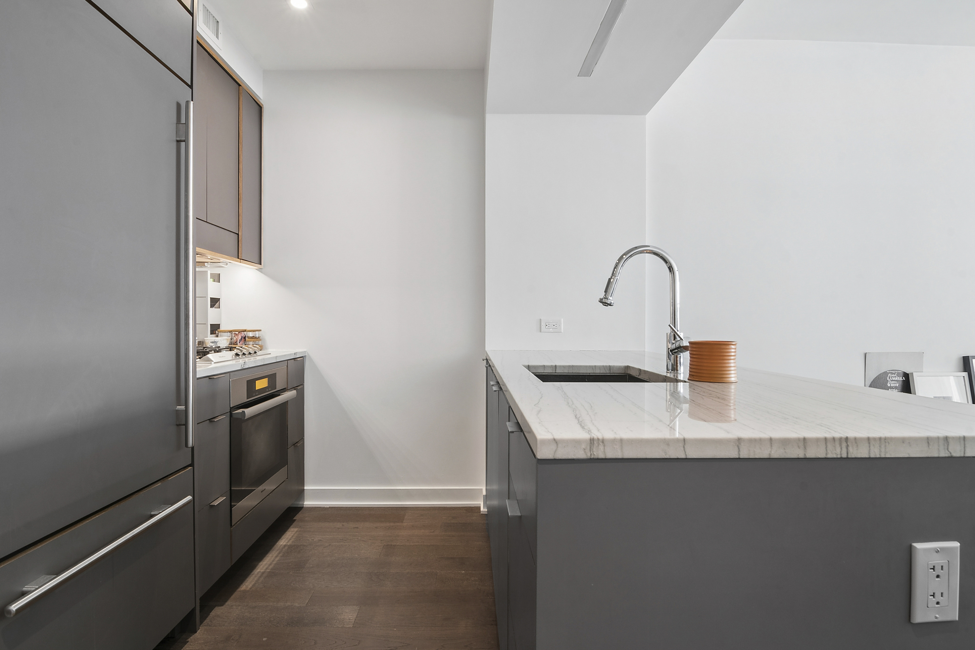 205 Water Street, Unit 2E Brooklyn, NY 11201 - Photo 5 of 12 a kitchen with a sink and a stove top oven