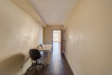 a view of entryway with wooden floor