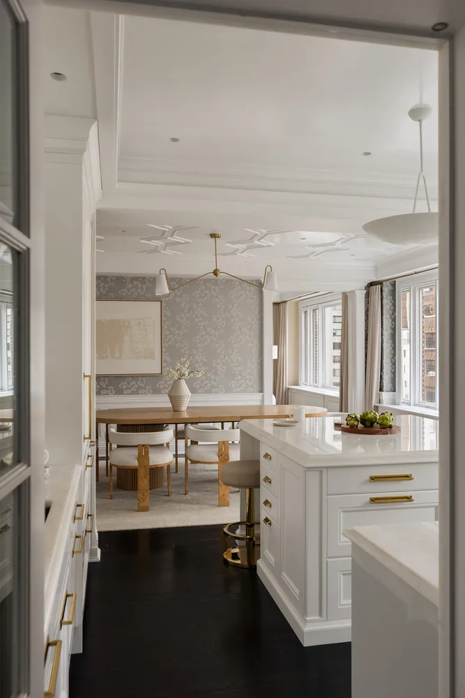 a kitchen with stainless steel appliances a sink and cabinets