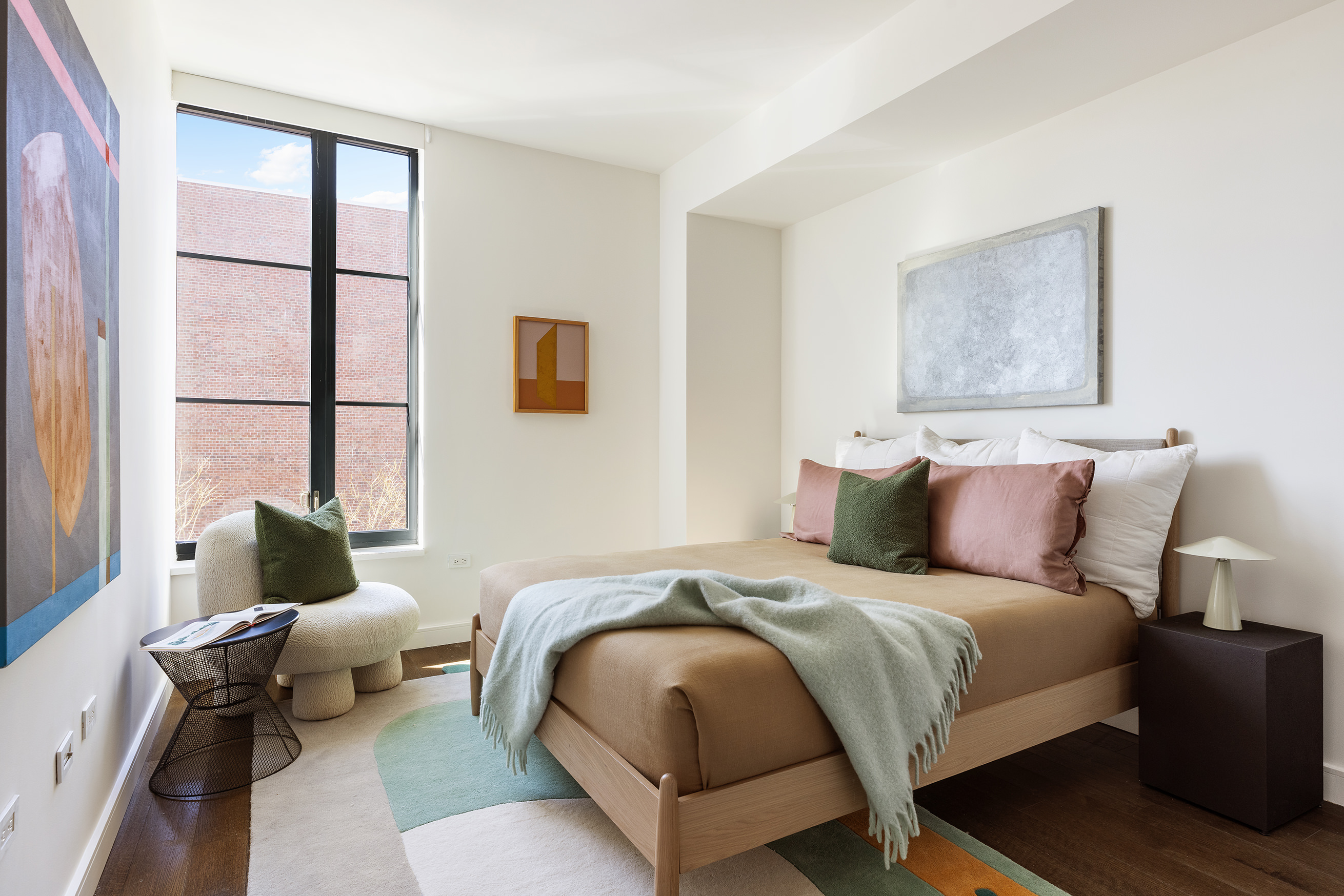 345 Carroll Street, Unit 4B Brooklyn, NY 11231 - Photo 7 of 16 a bedroom with a bed and wooden floor