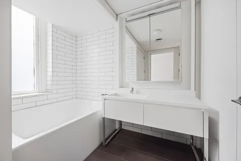 a bathroom with a sink and a bathtub