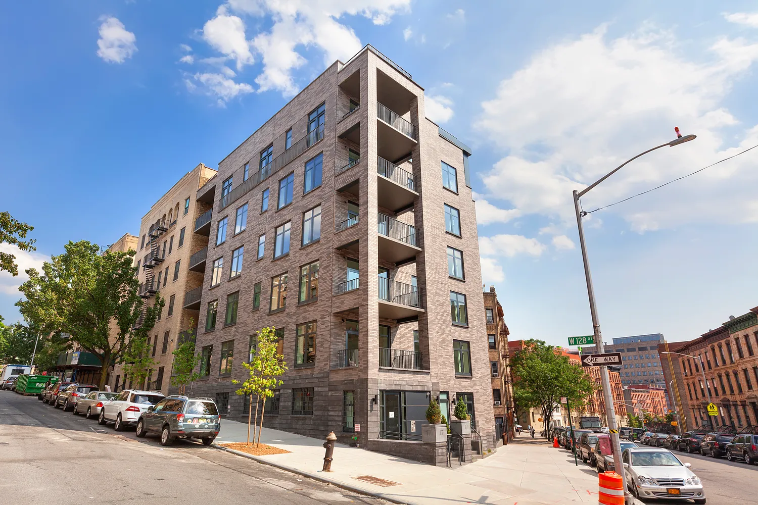 a city street lined with buildings and cars