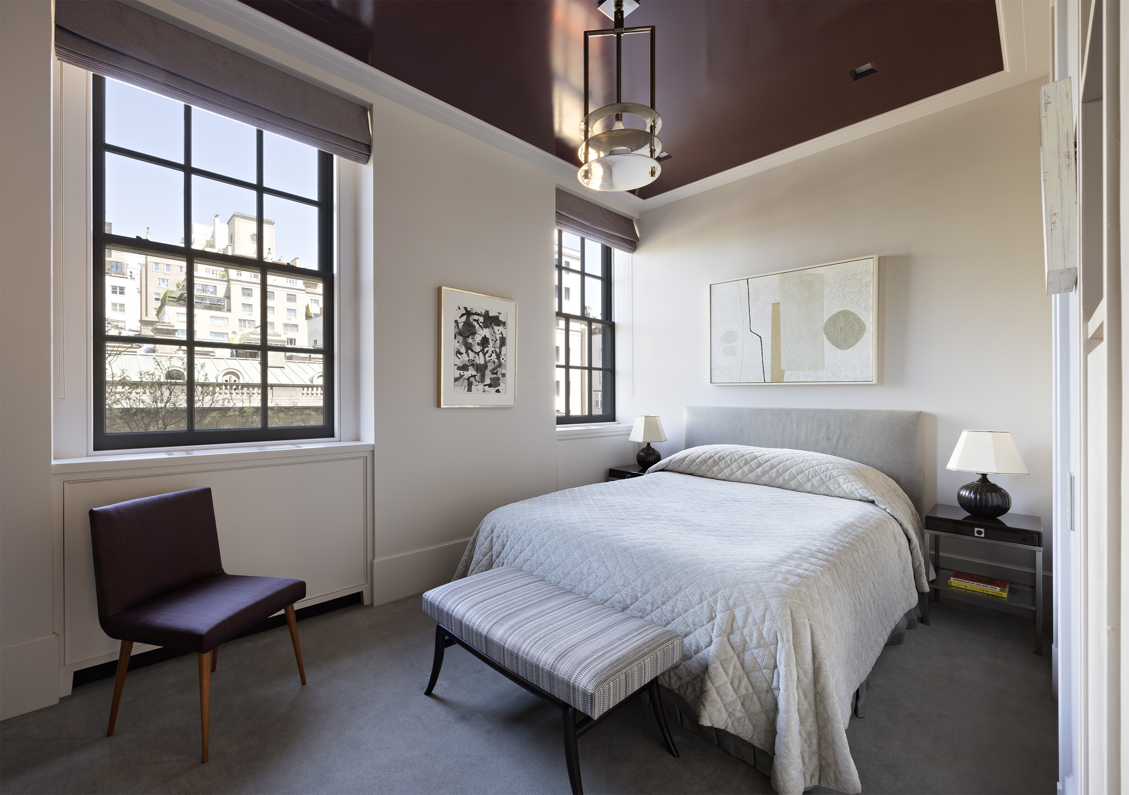 2 East 70th Street, Unit 4A Manhattan, NY 10021 - Photo 13 of 17 a bedroom with a bed table chair and a window