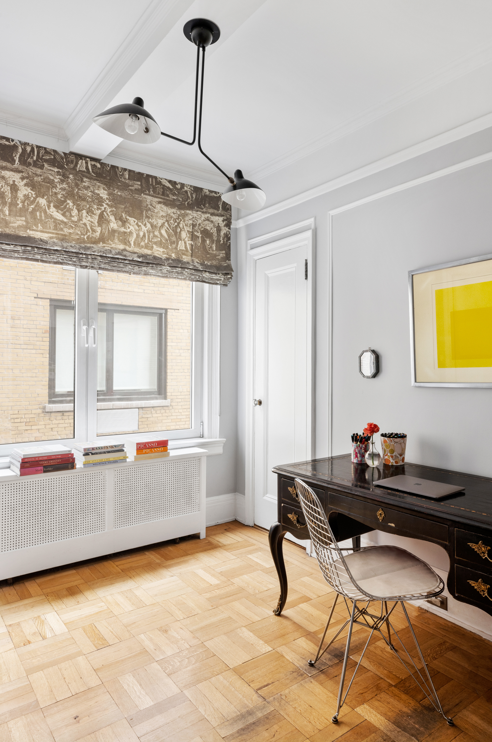 38 East 85th Street, Unit 10E Manhattan, NY 10028 - Photo 9 of 14 a living room with a couch