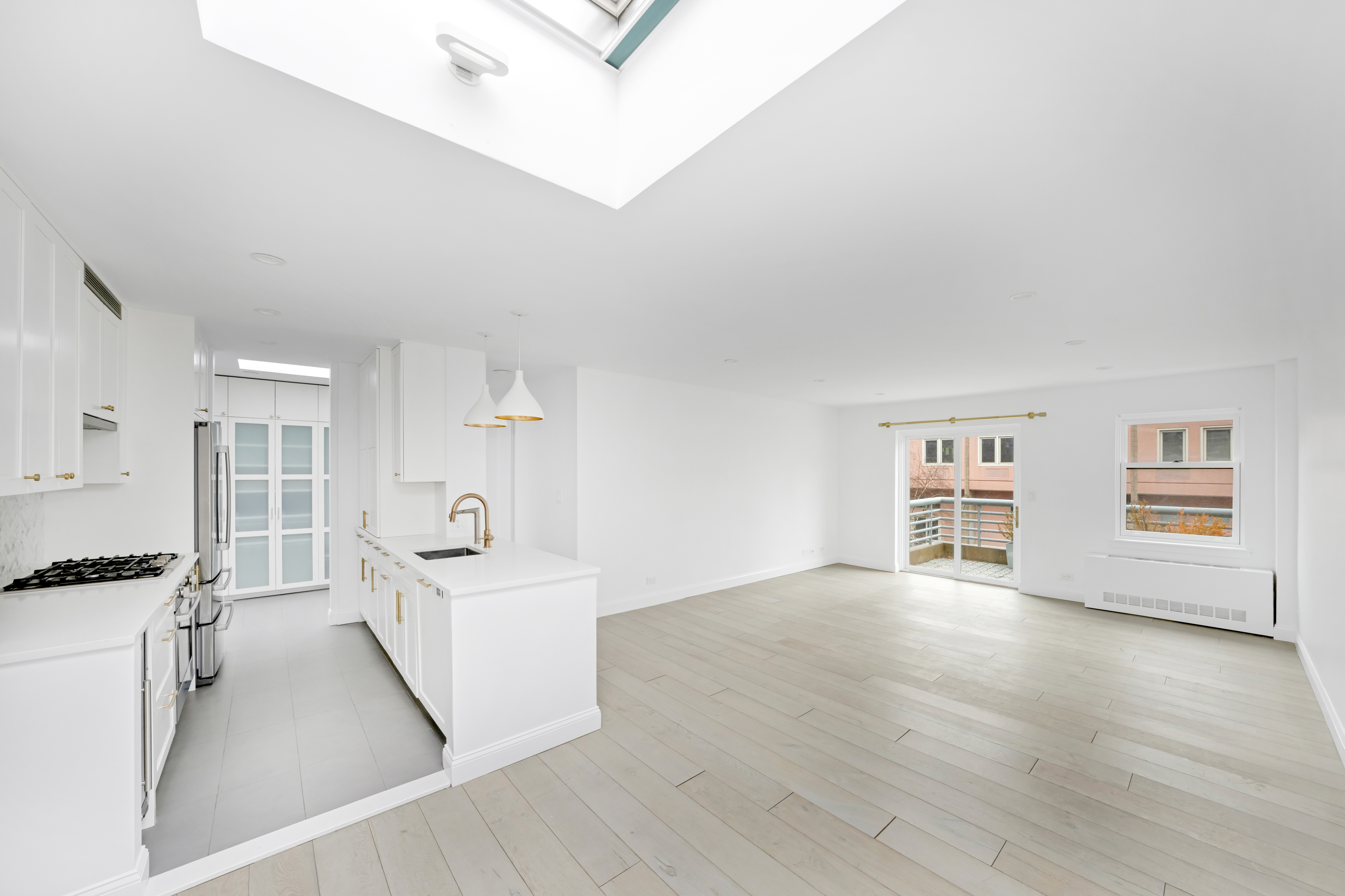 110 West 90th Street, Unit 5C Manhattan, NY 10024 - Photo 9 of 15 an empty room with wooden floor and windows