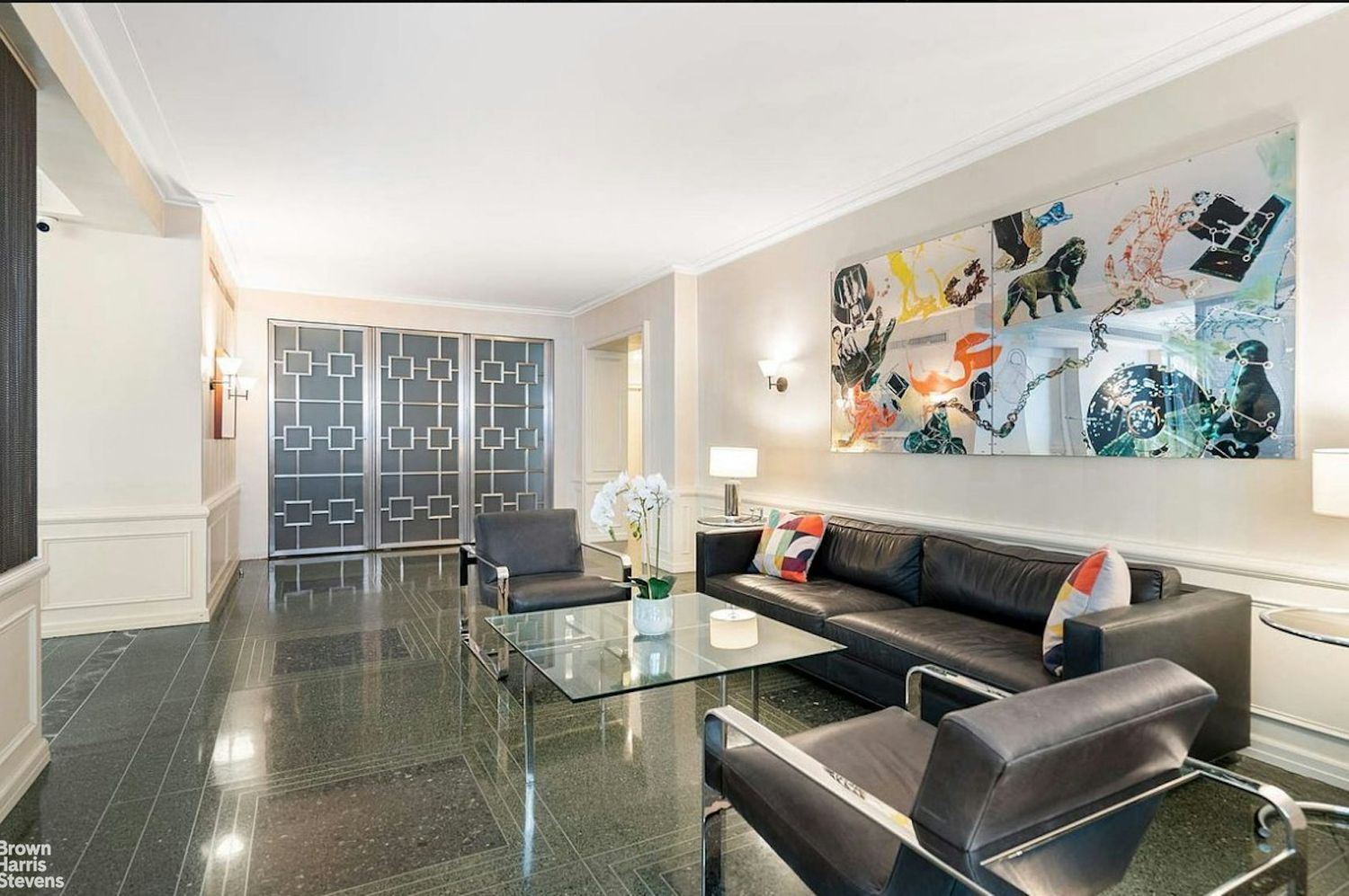 440 East 56th Street, Unit 8C Manhattan, NY 10022 - Photo 12 of 14 a living room with furniture and wooden floor