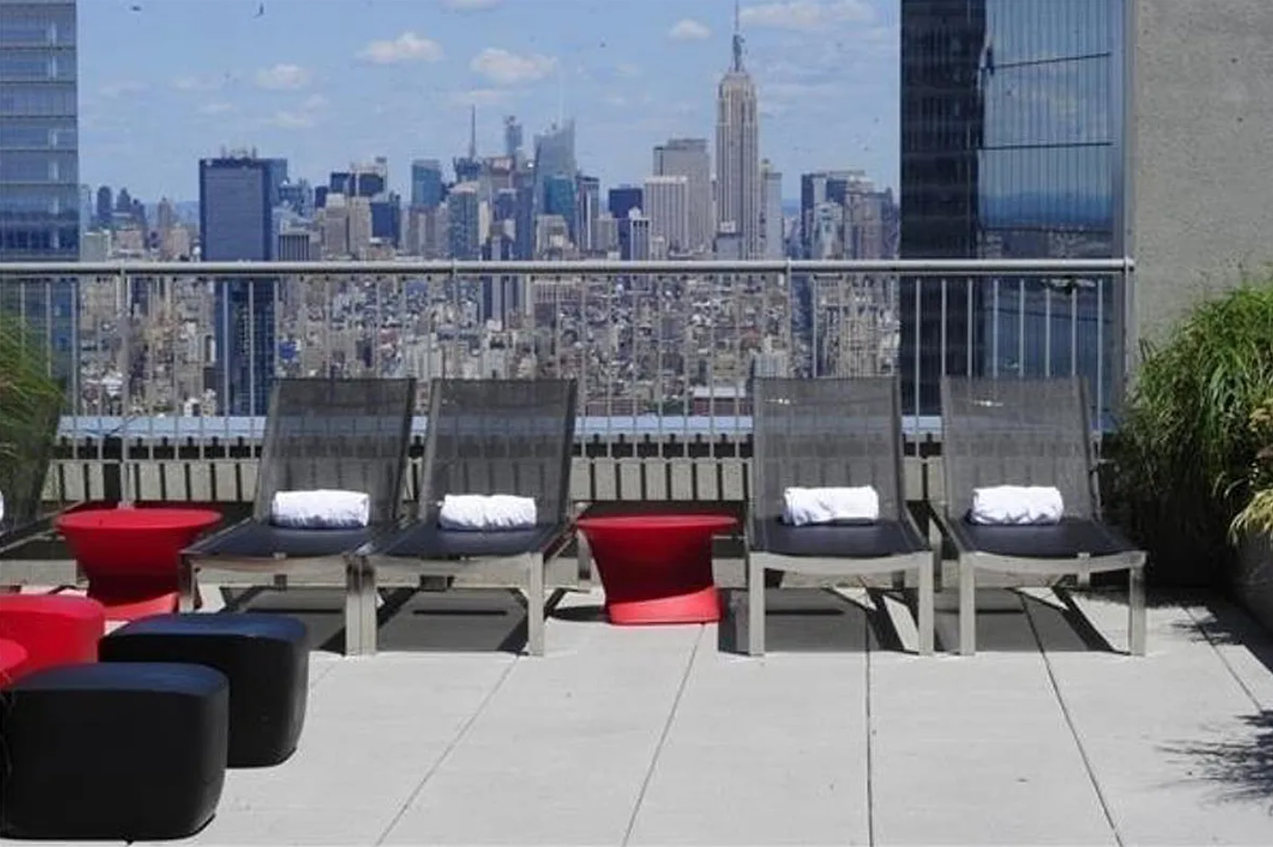 123 Washington Street, Unit 43F Manhattan, NY 10006 - Photo 6 of 8 a view of a terrace with sitting area