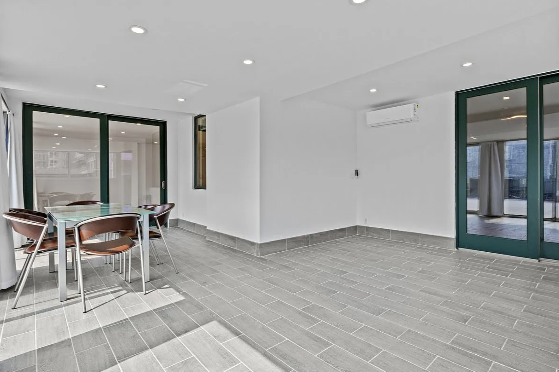 2882 West 15th Street, Unit 2B Brooklyn, NY 11224 - Photo 9 of 13 a view of a livingroom with furniture and window