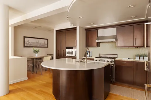 a open kitchen with stainless steel appliances granite countertop a sink a stove and refrigerator