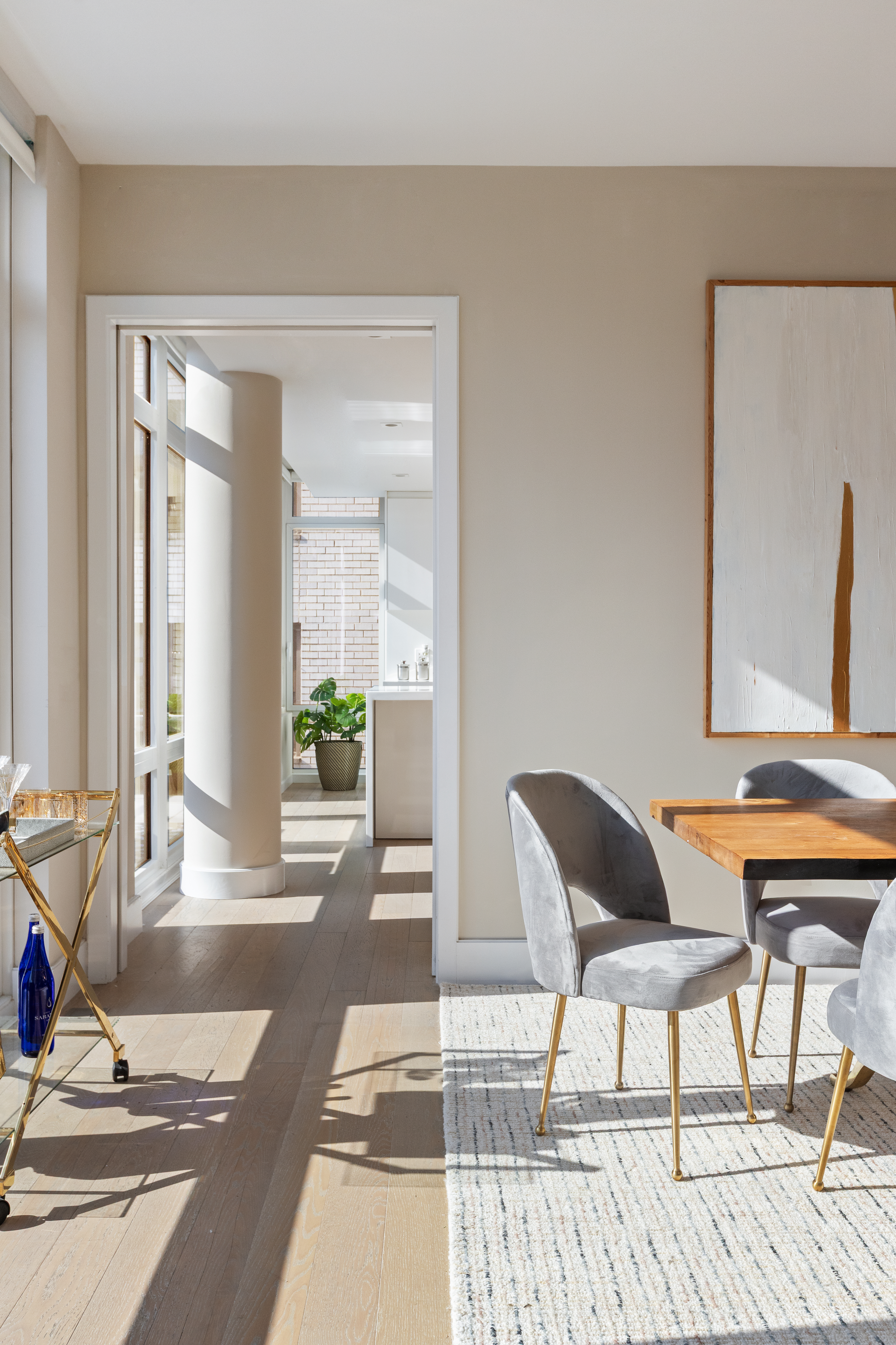 1355 1st Avenue, Unit 8 Manhattan, NY 10021 - Photo 4 of 25 a living room with a couch and a table