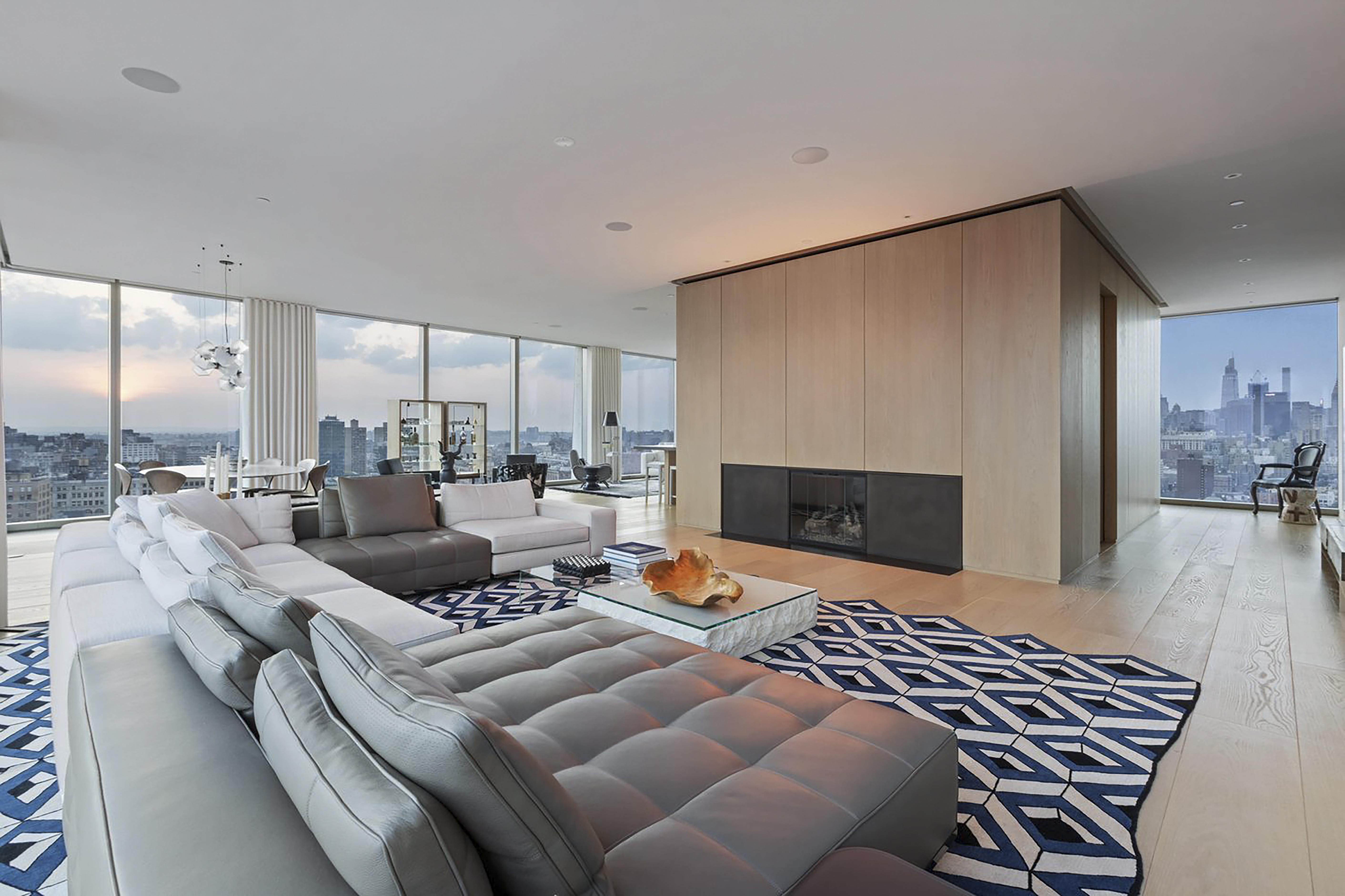 215 Chrystie Street, Unit PH2 Manhattan, NY 10002 - Photo 3 of 30 a outdoor living space with furniture and a fireplace