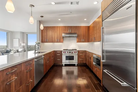 a kitchen with a stove and a sink