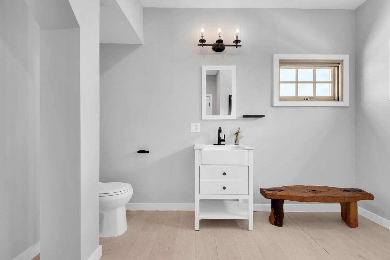 7921 Narrows Avenue Brooklyn, NY 11209 - Photo 30 of 42 a bathroom with a sink toilet and mirror