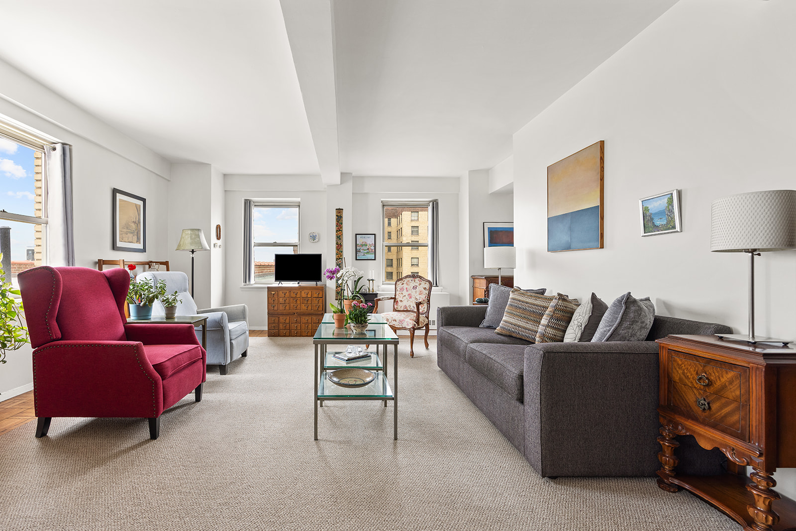 111 Hicks Street, Unit 11B Brooklyn, NY 11201 - Photo 2 of 12 a living room with furniture and a lamp