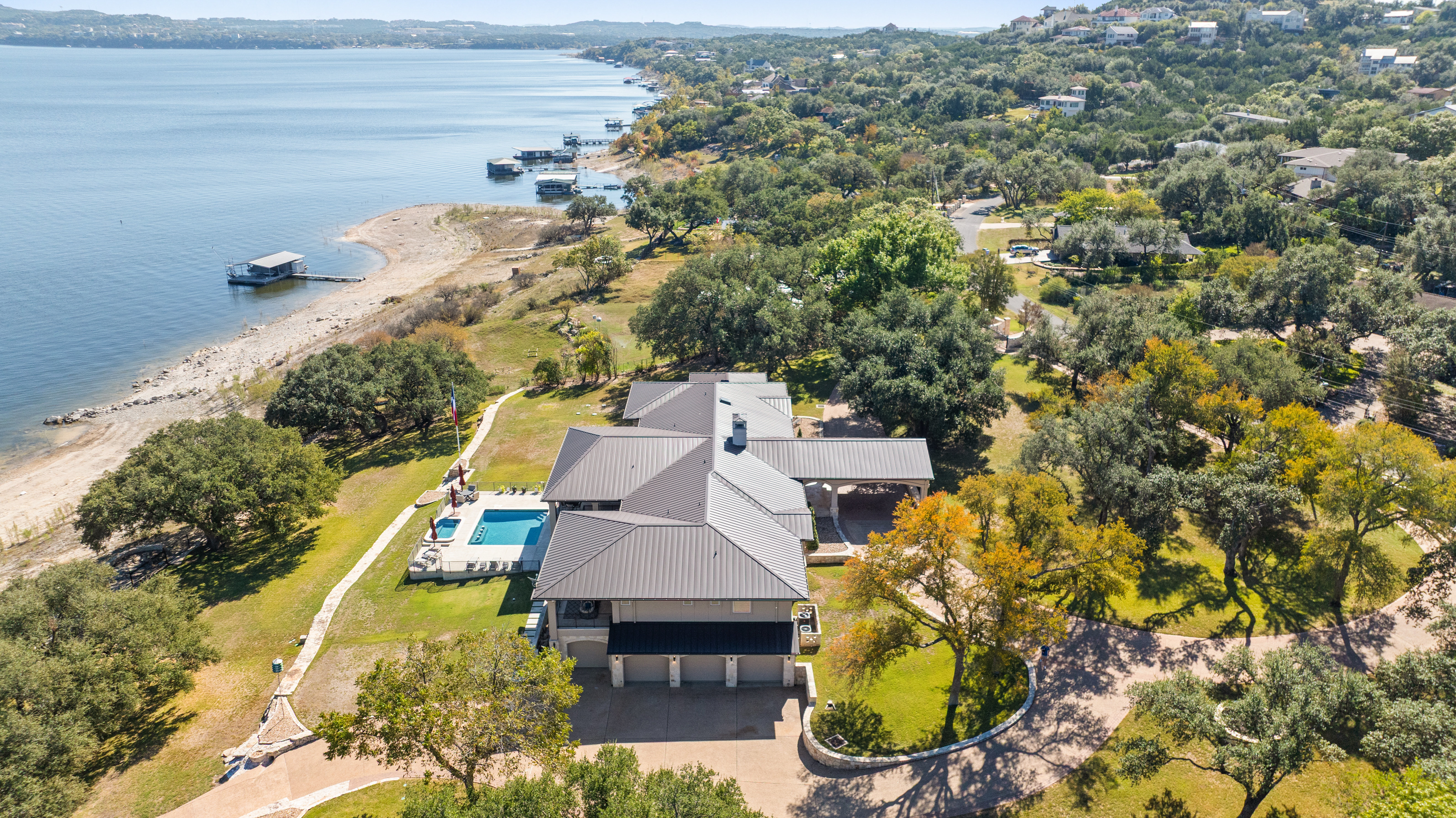 15210 Rainbow 1 Street Austin, TX 78734 - Photo 23 of 138 an aerial view of a house with swimming pool and large trees