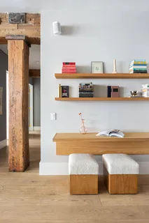 a view of kitchen with stainless steel appliances granite countertop cabinets and wooden floor