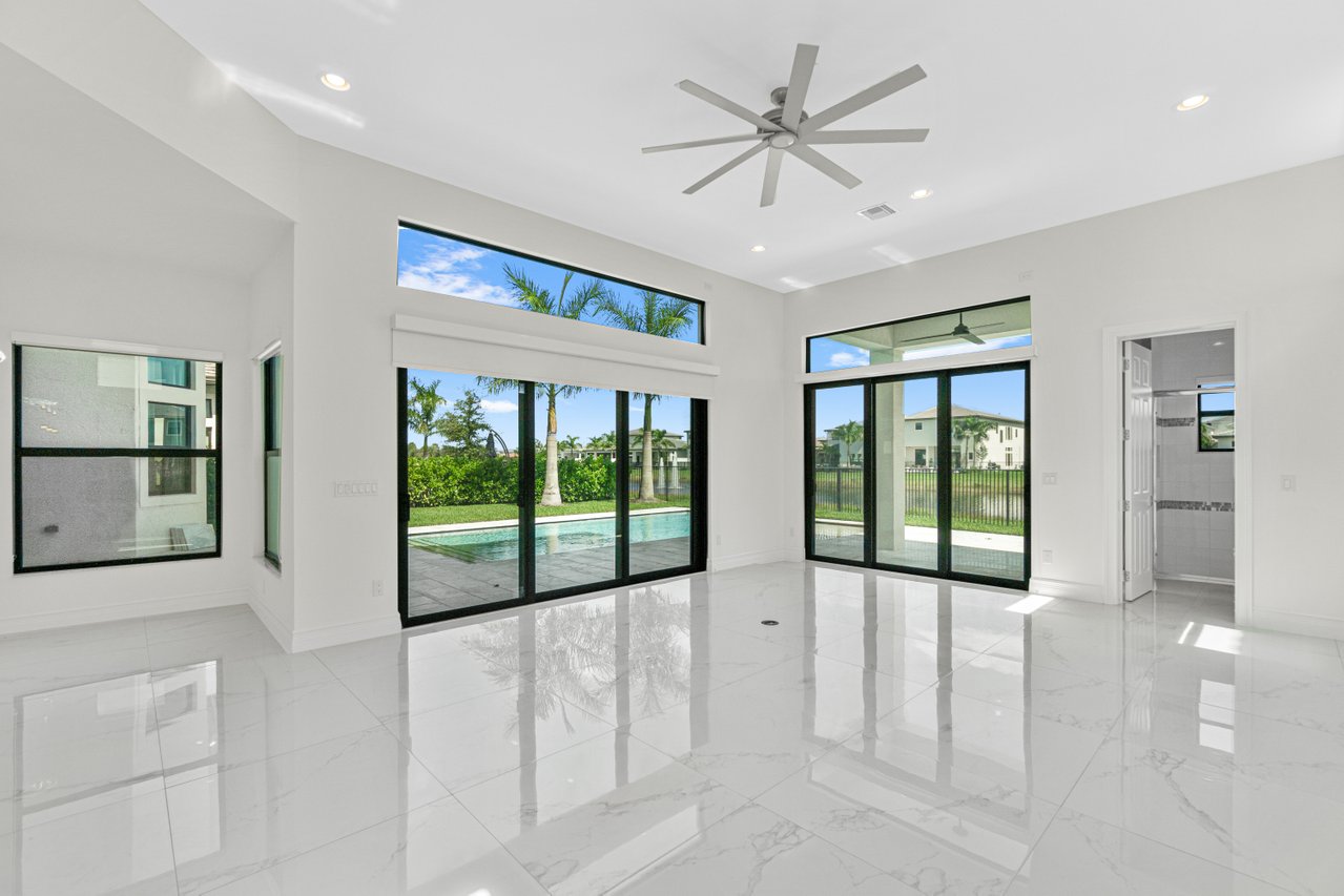 17352 Rosella Road Boca Raton, FL 33496 - Photo 12 of 41 a view of an entryway with wooden floor and door