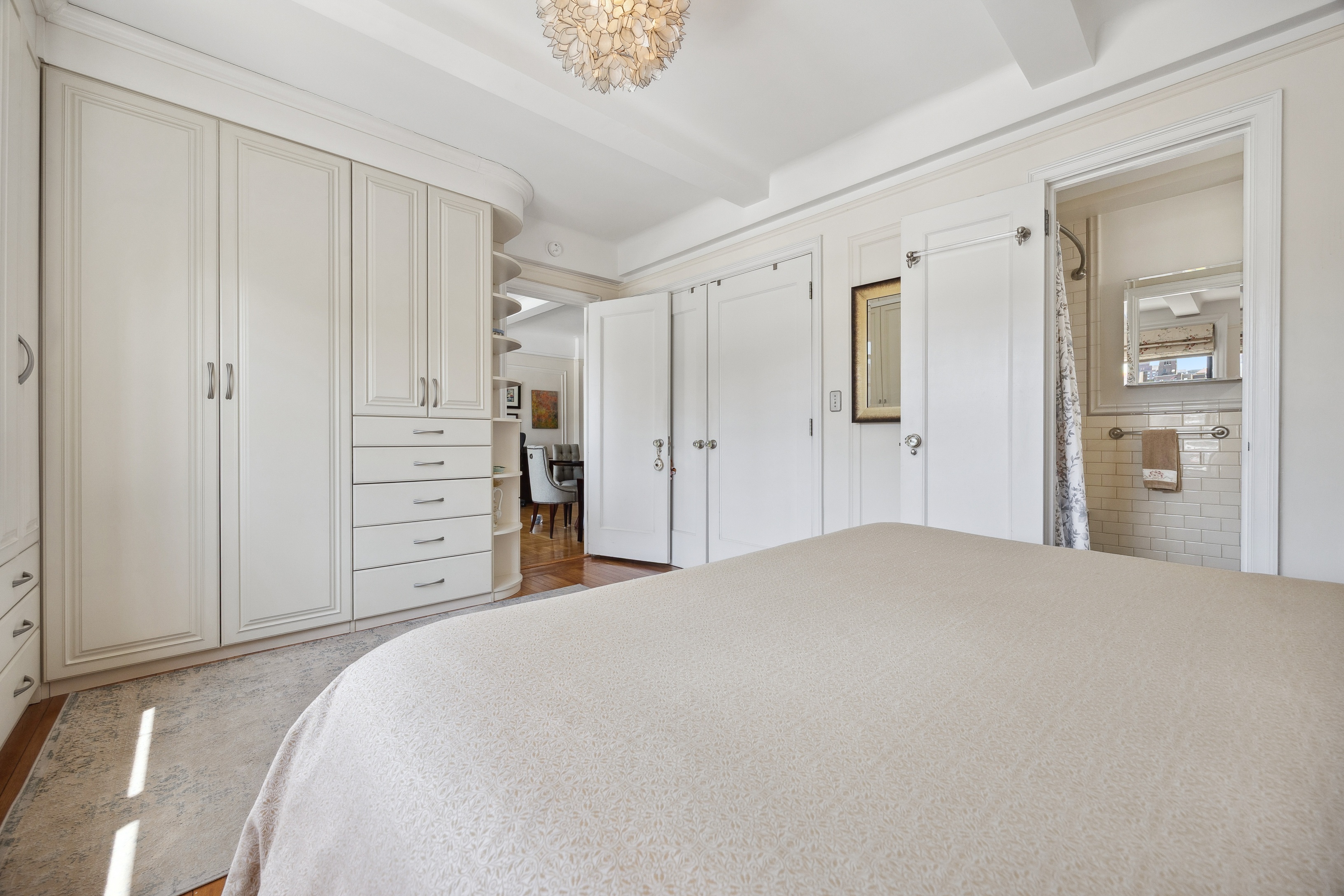 40 West 77th Street, Unit 8C Manhattan, NY 10024 - Photo 12 of 21 a bedroom with a bed and closet