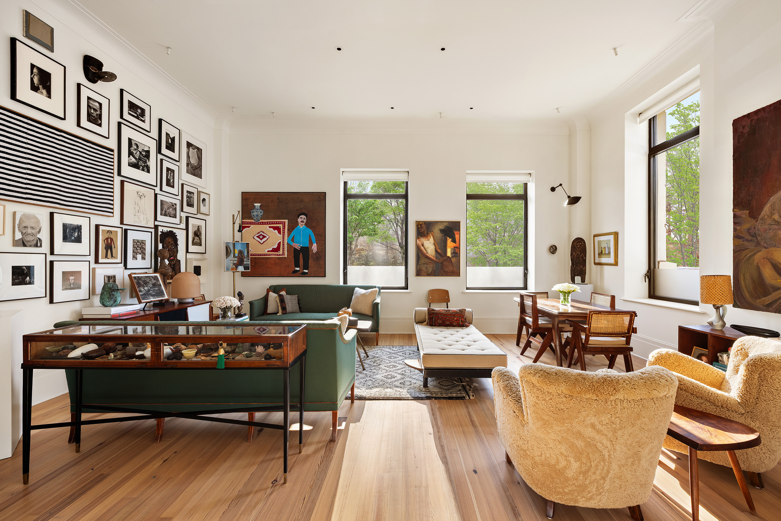 1 Prospect Park West, Unit 2B Brooklyn, NY 11215 - Photo 3 of 23 a living room with fireplace furniture and a large window