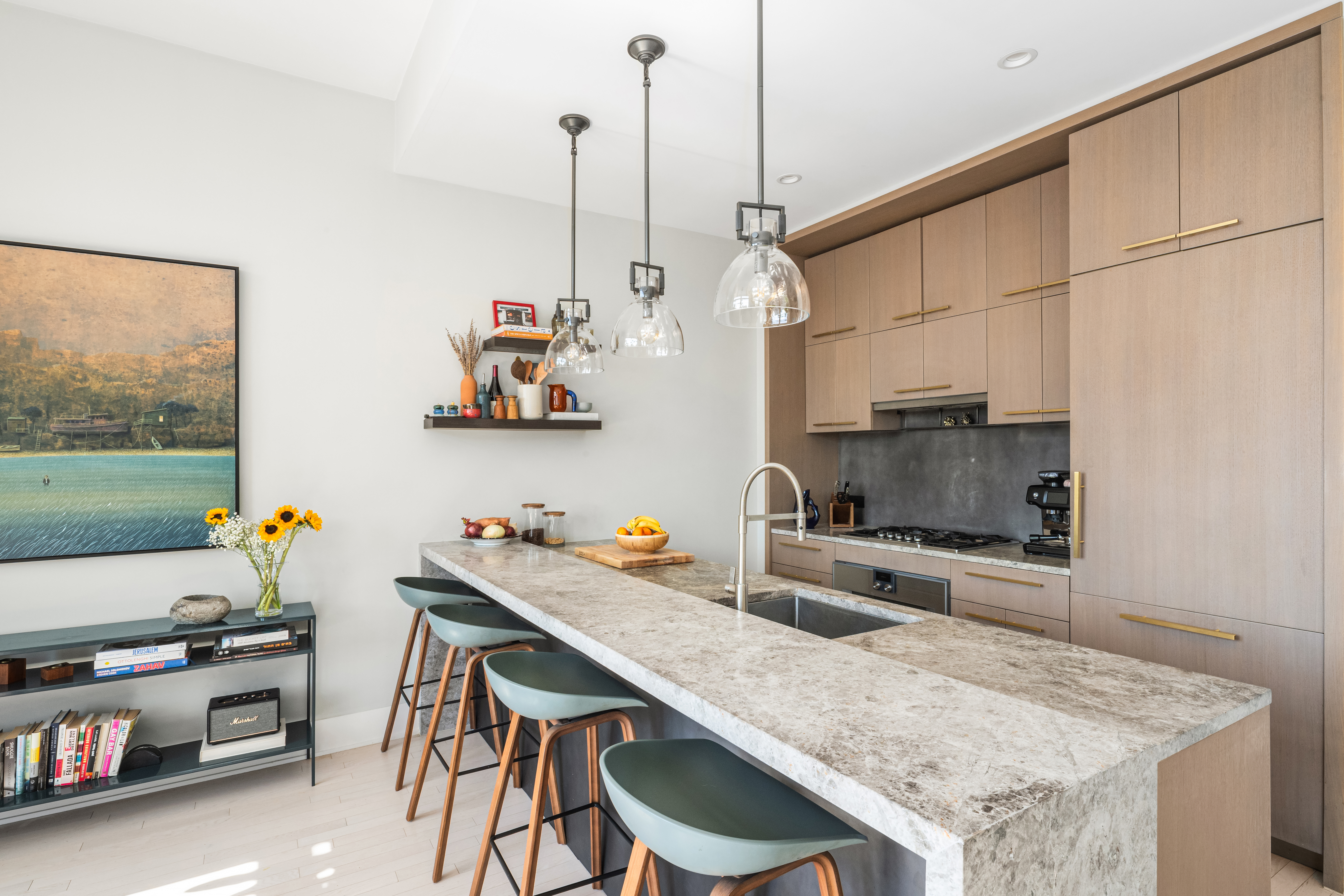 91 Leonard Street, Unit 16B Manhattan, NY 10013 - Photo 6 of 20 a kitchen with stainless steel appliances granite countertop a sink a stove and a wooden floor