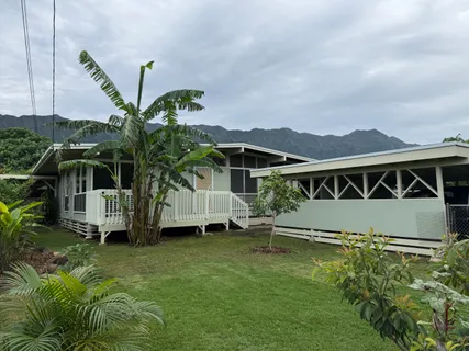 a house view with a garden space