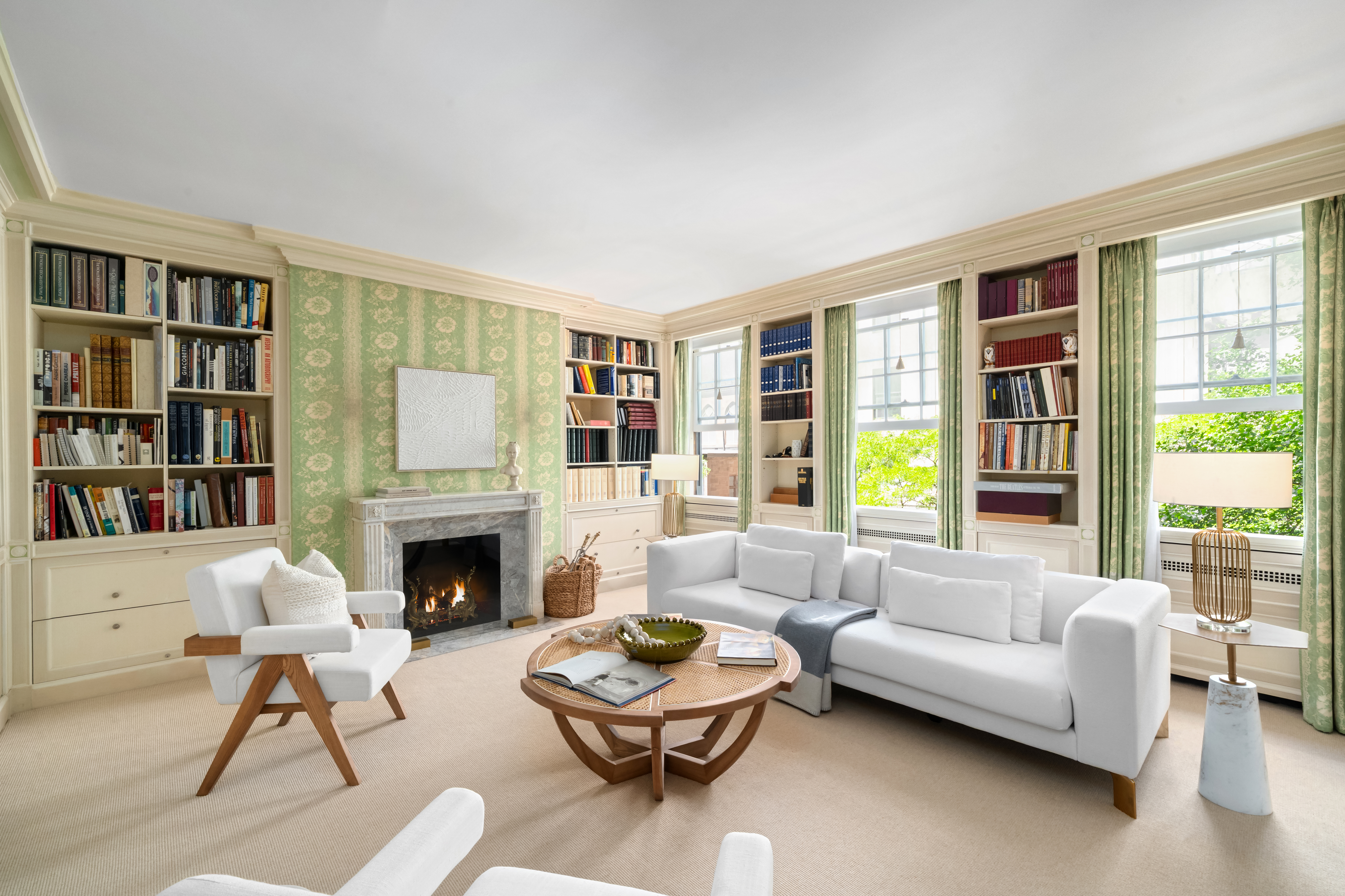 46 East 71st Street Manhattan, NY 10021 - Photo 16 of 27 a living room with furniture and a fireplace