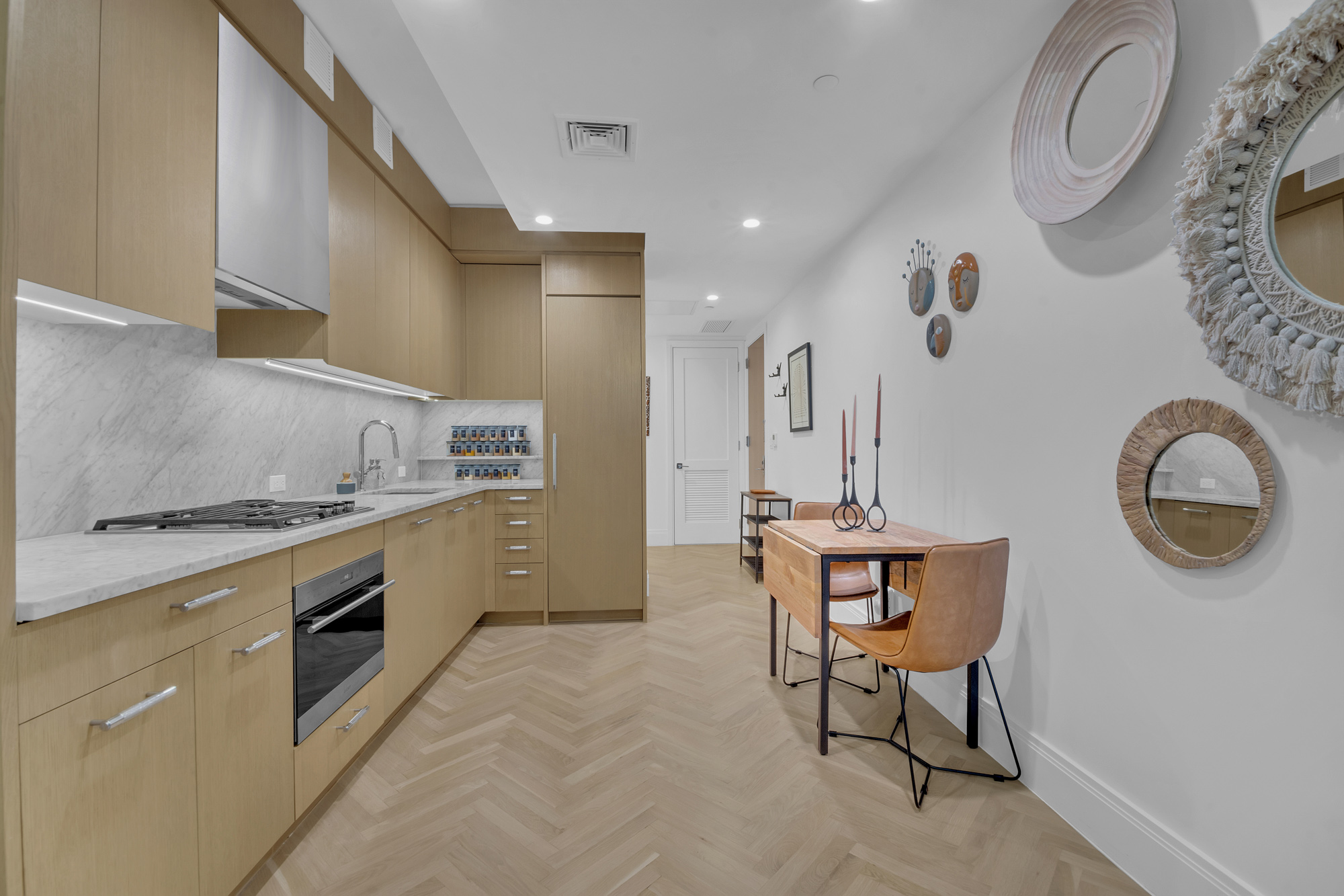 300 West 122nd Street, Unit 6R Manhattan, NY 10027 - Photo 4 of 23 a kitchen with stainless steel appliances granite countertop a sink a stove and a refrigerator