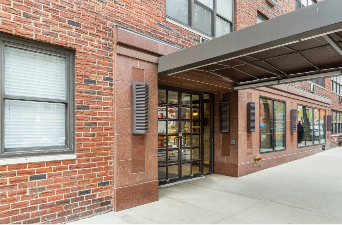 330 3rd Avenue, Unit 8A Manhattan, NY 10010 - Photo 11 of 13 a view of a brick house with a large windows