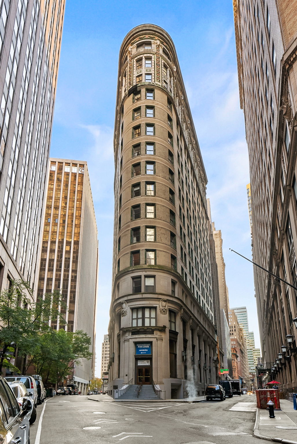 1 Wall Street Court, Unit 1405 Manhattan, NY 10005 - Photo 18 of 19 front view of a large building