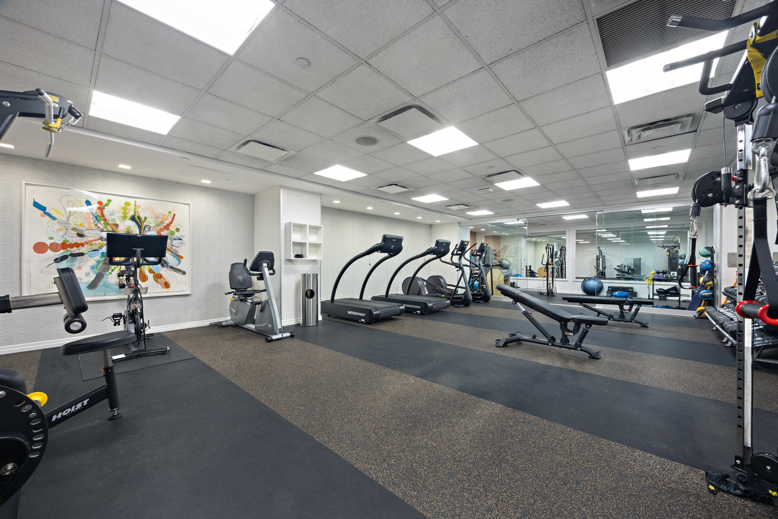 177 9th Avenue, Unit 3K Manhattan, NY 10011 - Photo 12 of 14 a view of a room with gym equipment