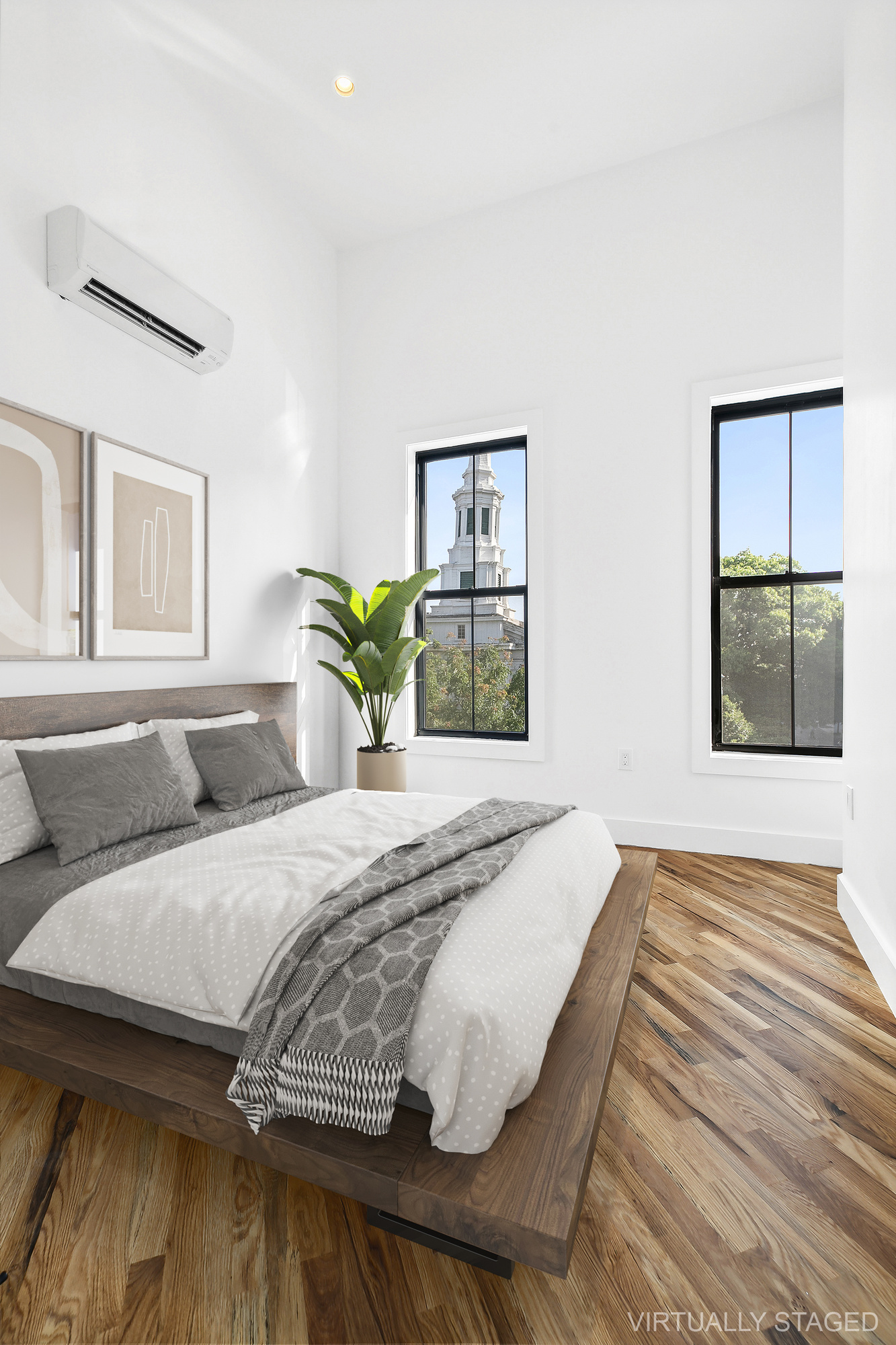 866 Bushwick Avenue, Unit 2 Brooklyn, NY 11221 - Photo 6 of 12 a bedroom with a bed and wooden floor