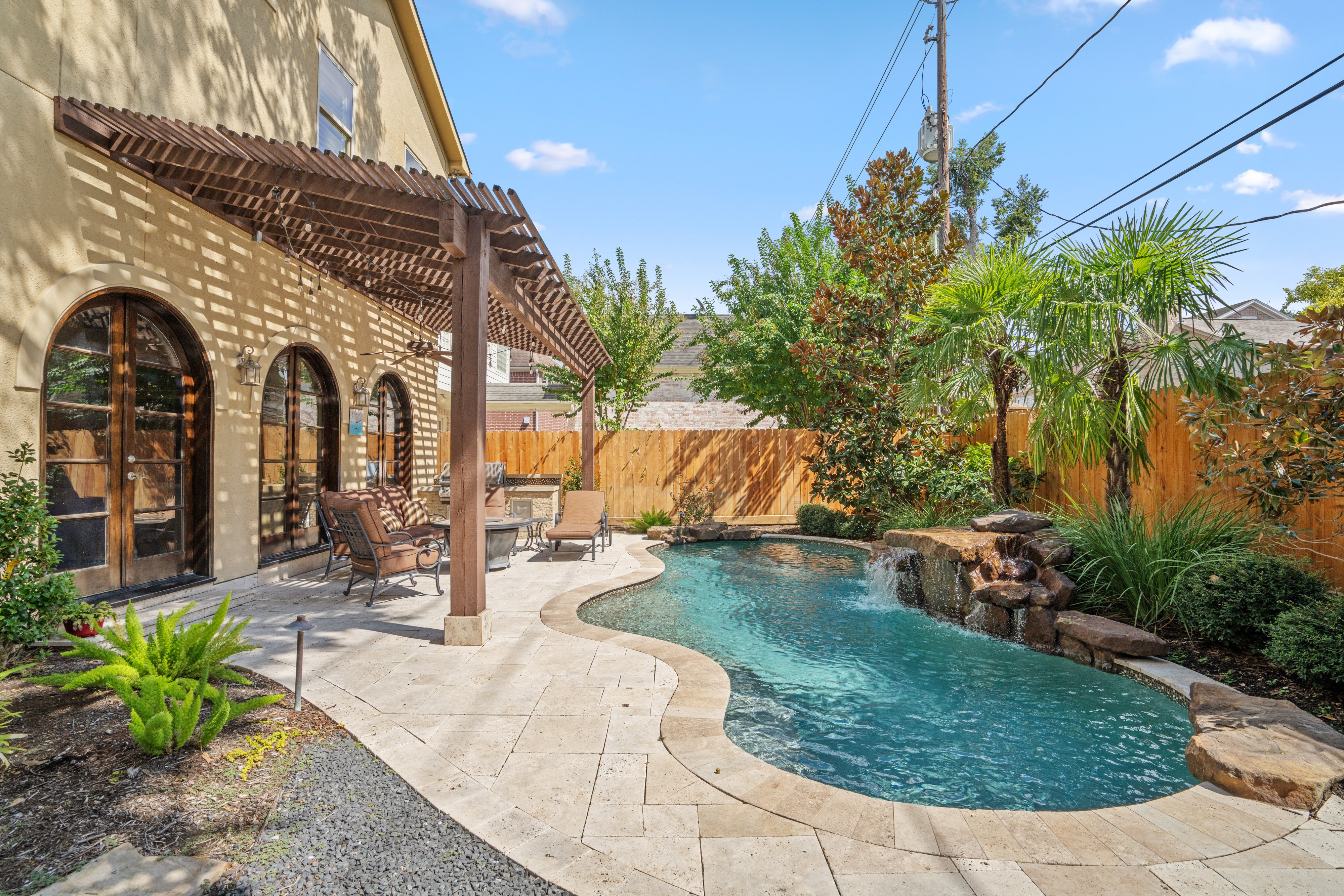 4219 Oberlin Street West University Place, TX 77005 - Photo 25 of 33 a view of a house with a patio