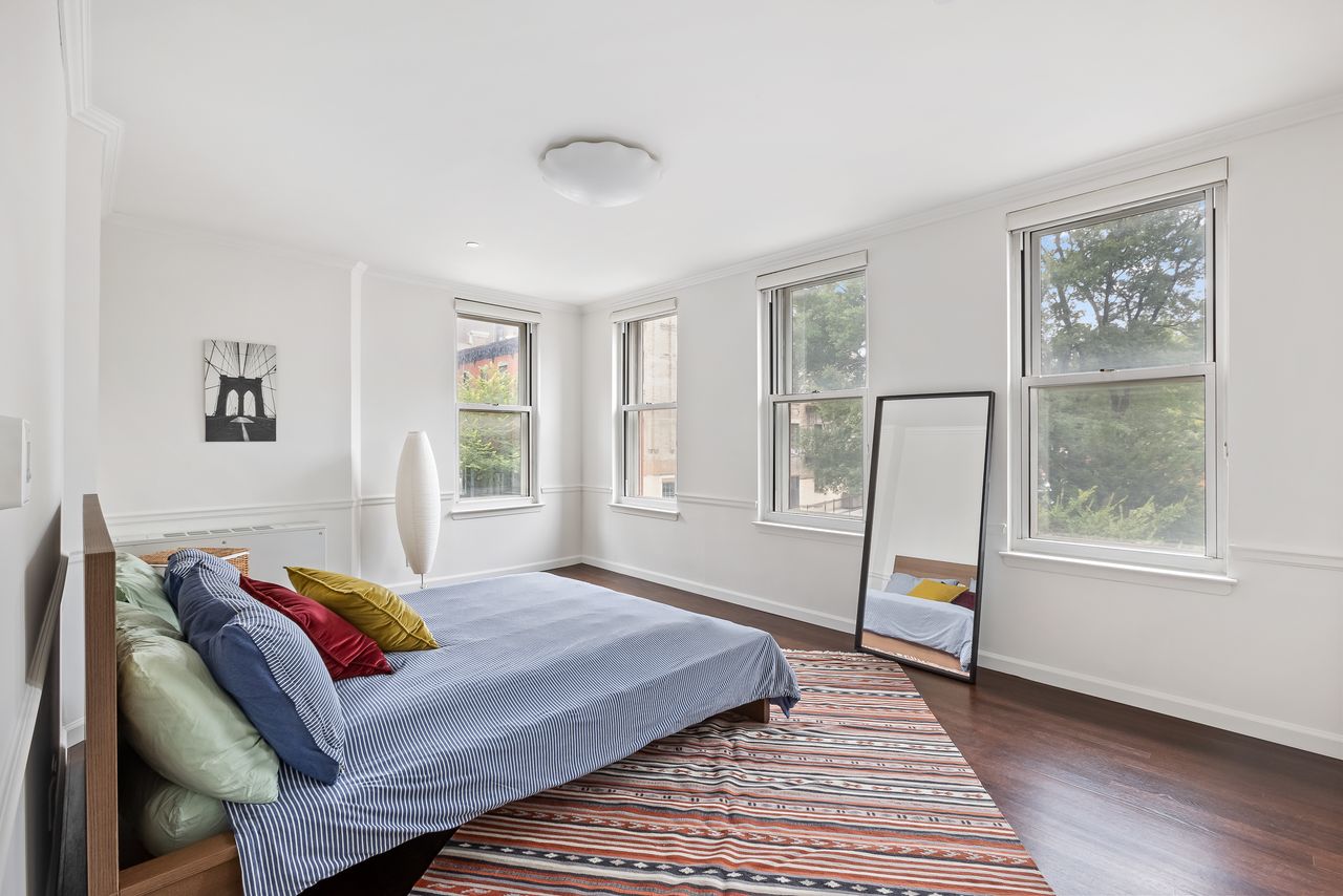 55 Poplar Street, Unit 2C Brooklyn, NY 11201 - Photo 5 of 14 a bedroom with a bed and a window