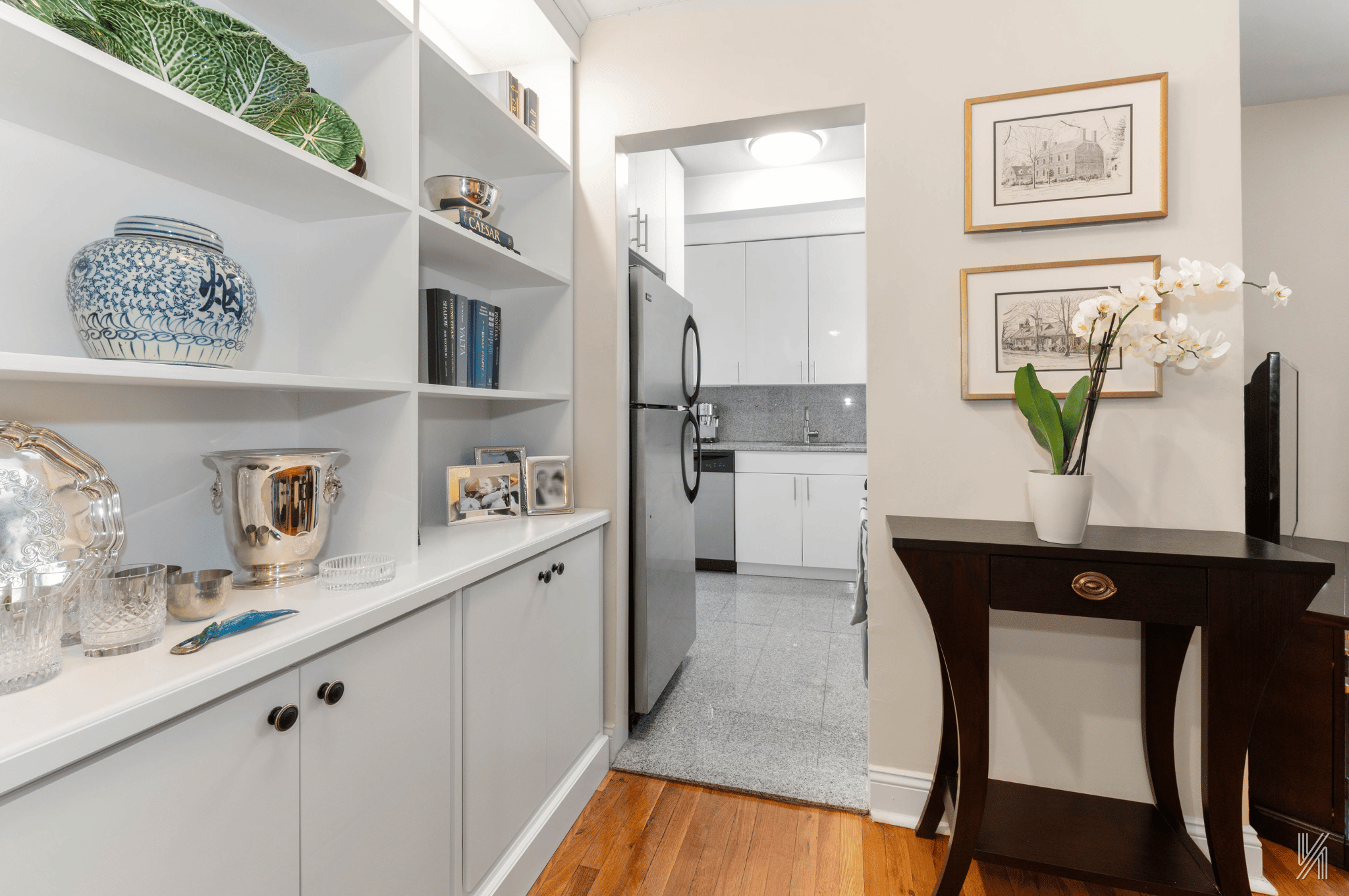 22-40 80th Street, Unit 3B Queens, NY 11370 - Photo 7 of 14 a kitchen with stainless steel appliances a dining table chairs and window