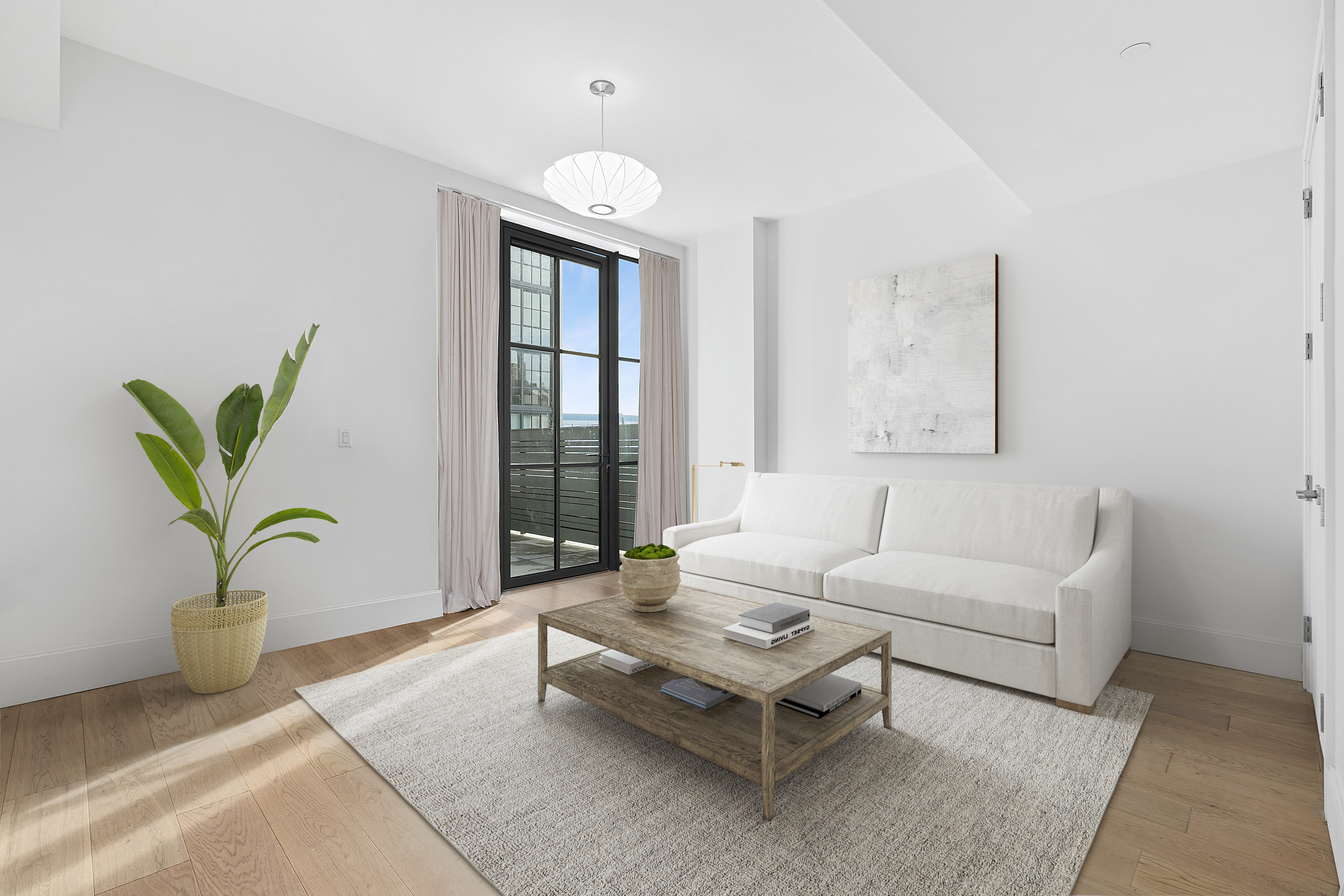 22-18 Jackson Avenue, Unit 209 Queens, NY 11101 - Photo 4 of 14 a living room with furniture and a potted plant