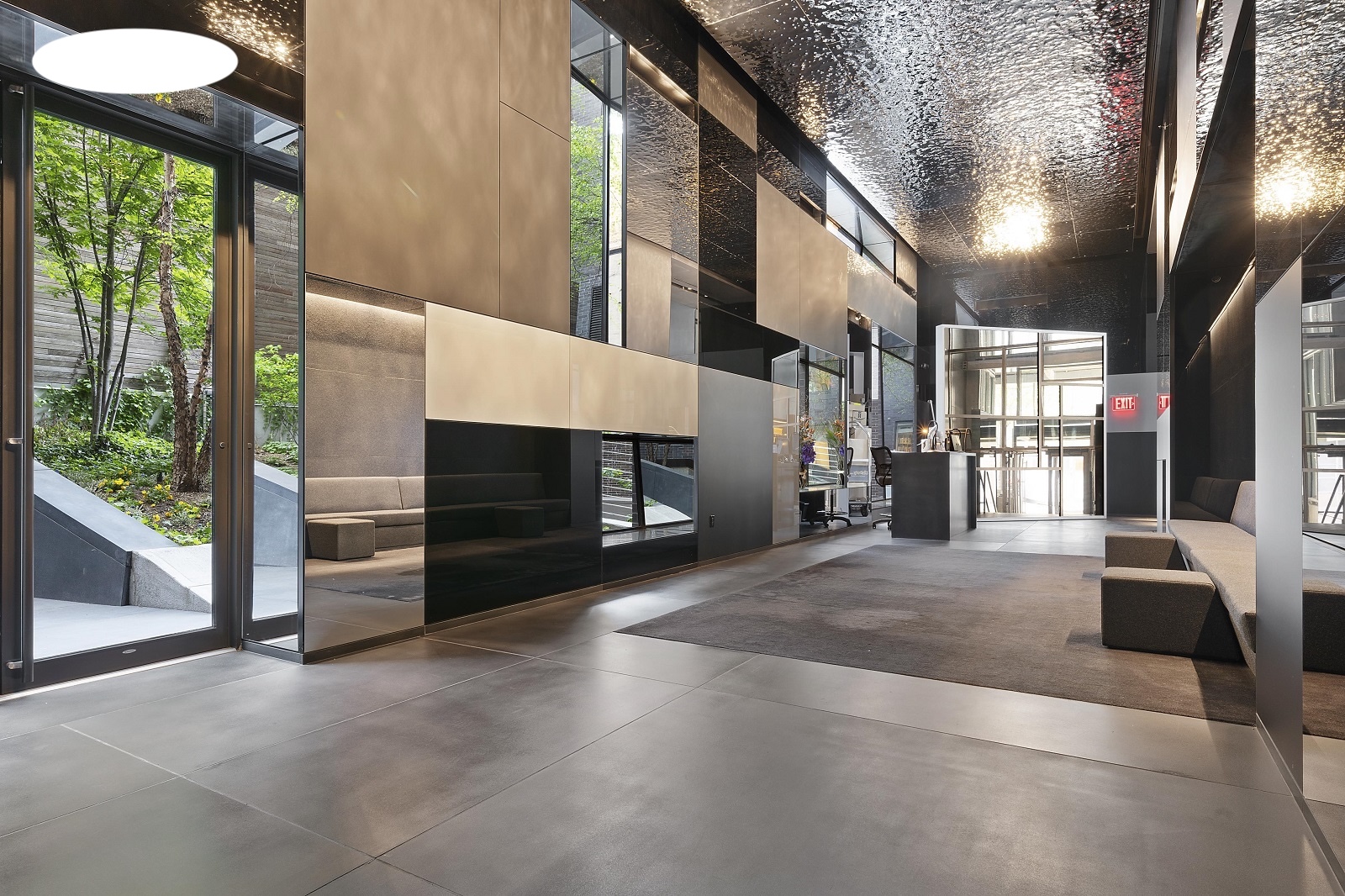 100 11th Avenue, Unit 9D Manhattan, NY 10011 - Photo 13 of 17 a view of an empty room with a fireplace and windows