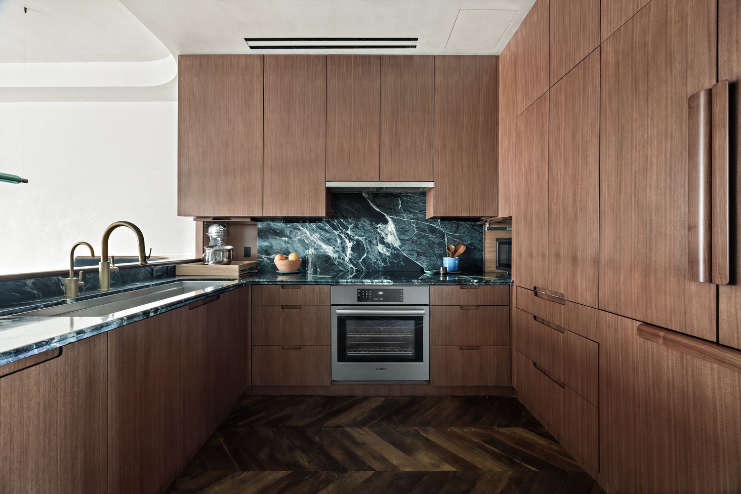 a kitchen with a sink and cabinets