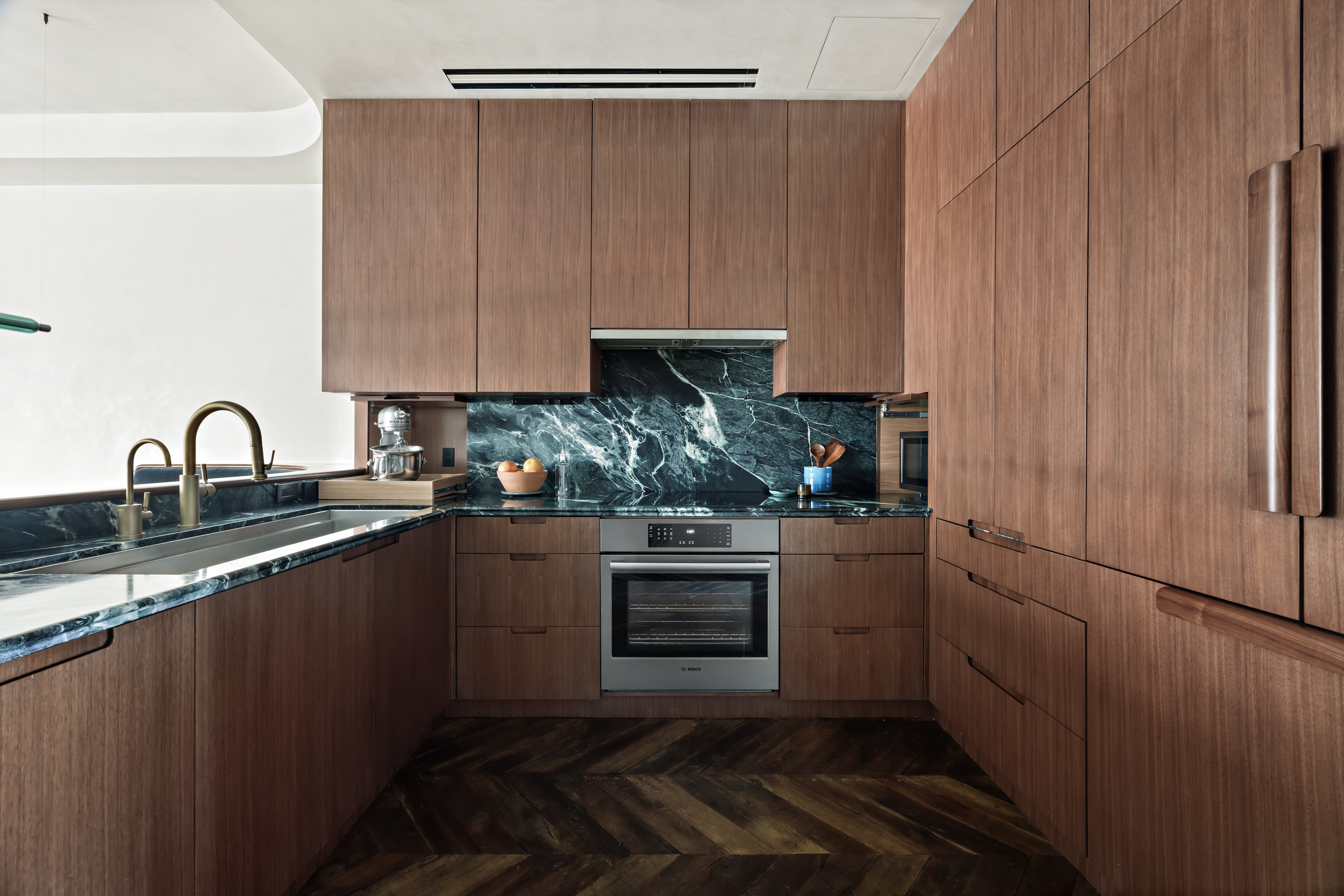 109 Greene Street, Unit PH6A Manhattan, NY 10012 - Photo 6 of 26 a kitchen with a sink and cabinets